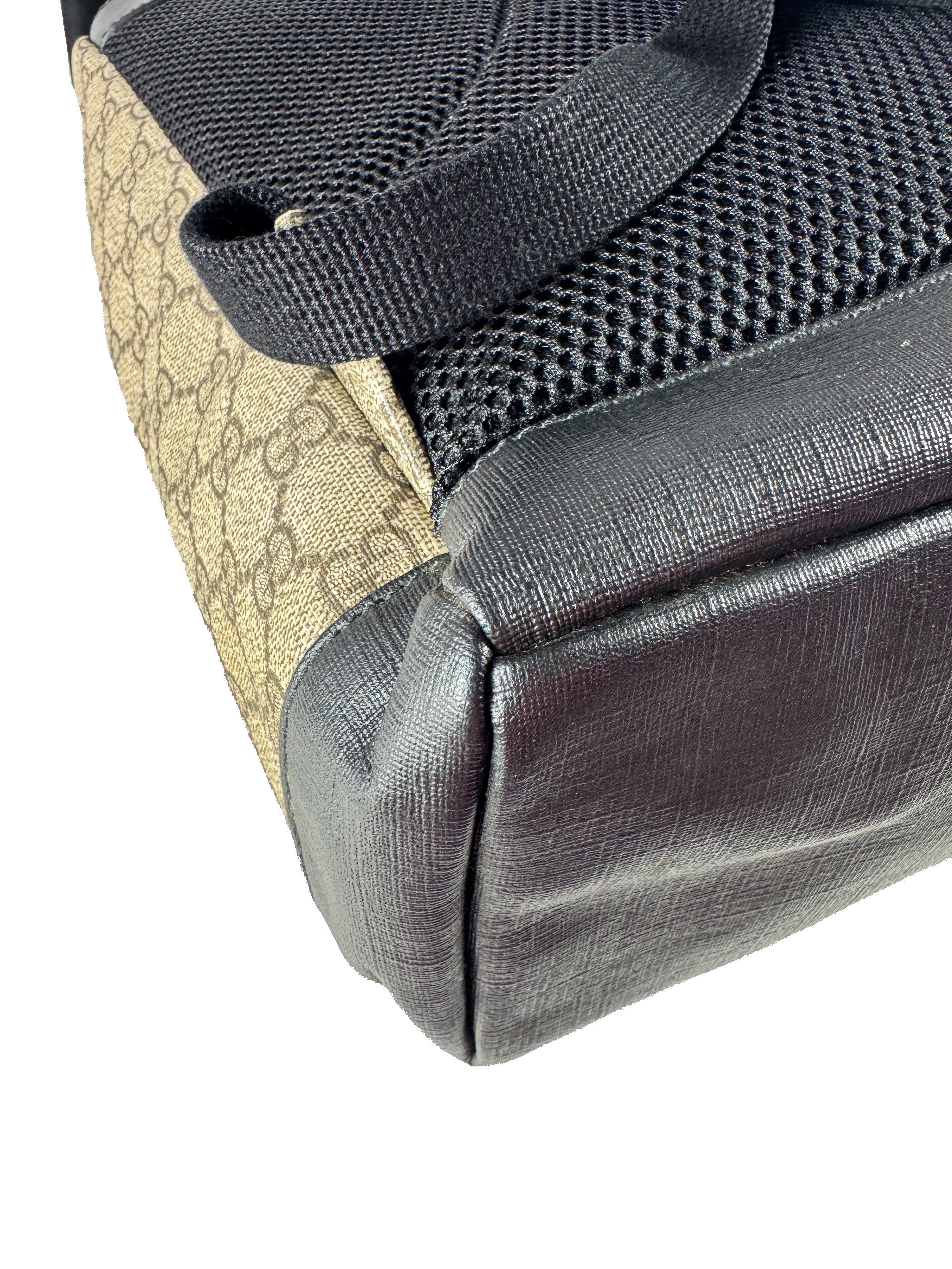 Gucci GG Supreme buckle backpack