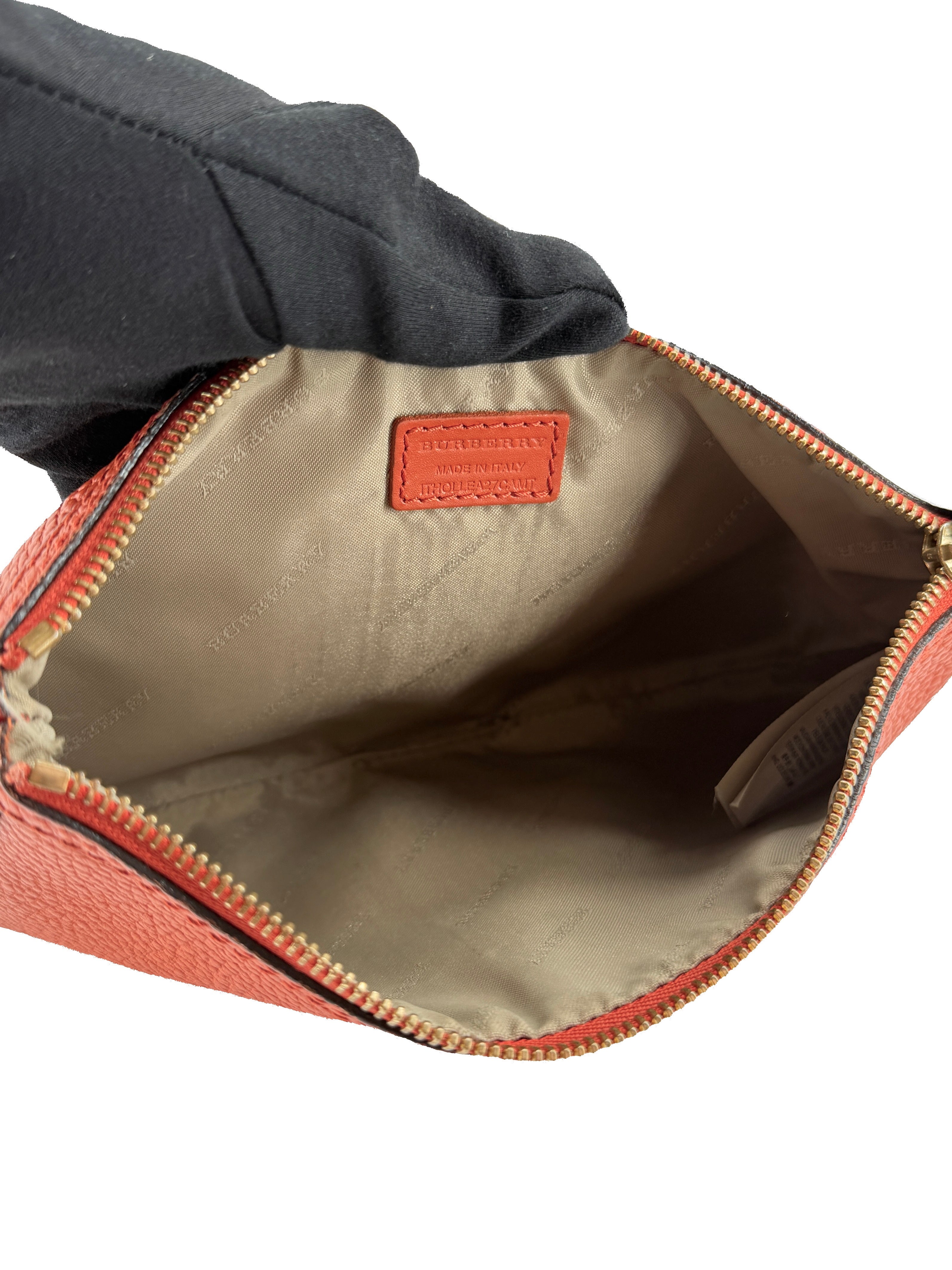 Burberry orange leather wristlet