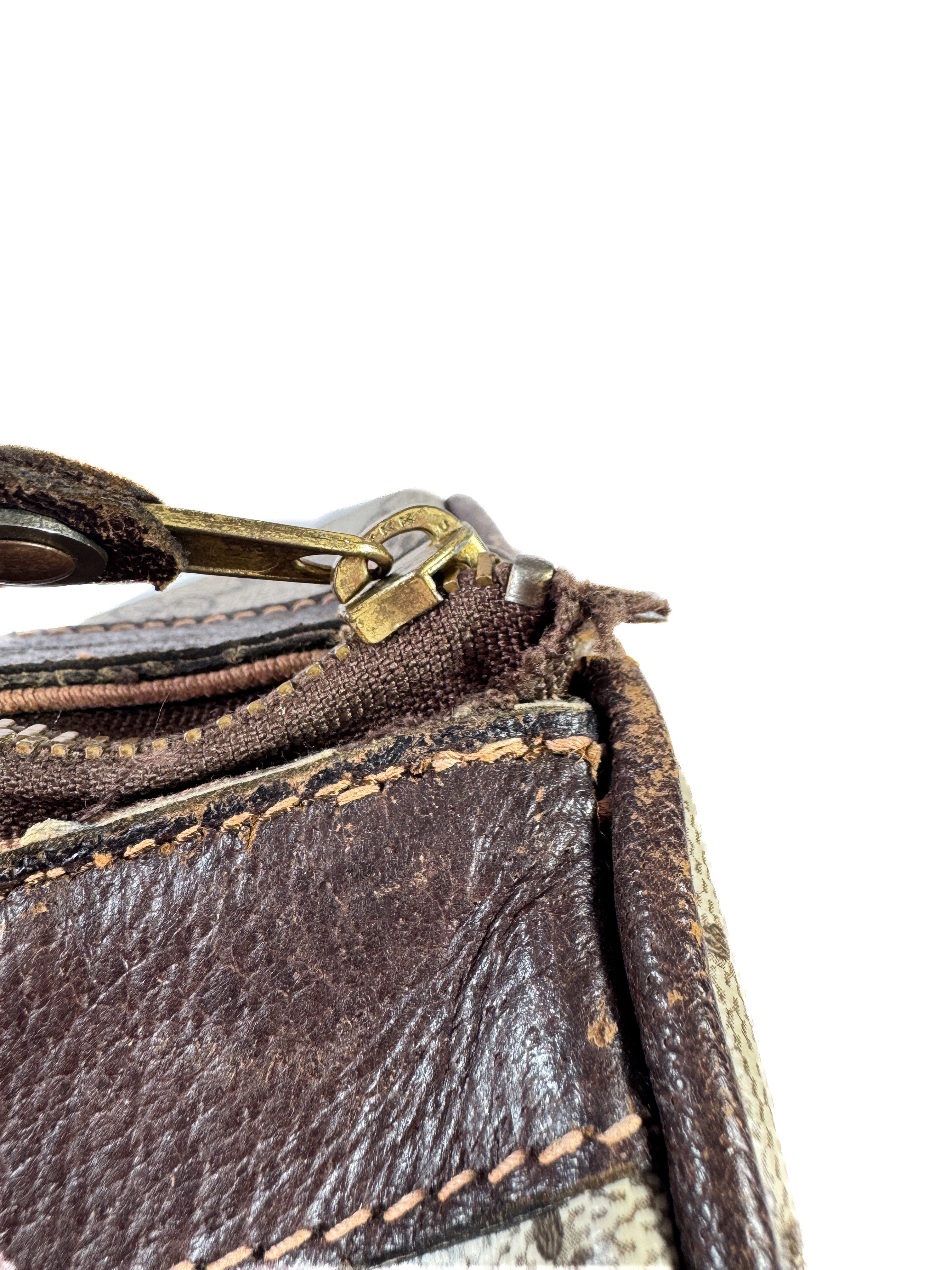 Gucci Supreme 1980s signature mini duffle bag