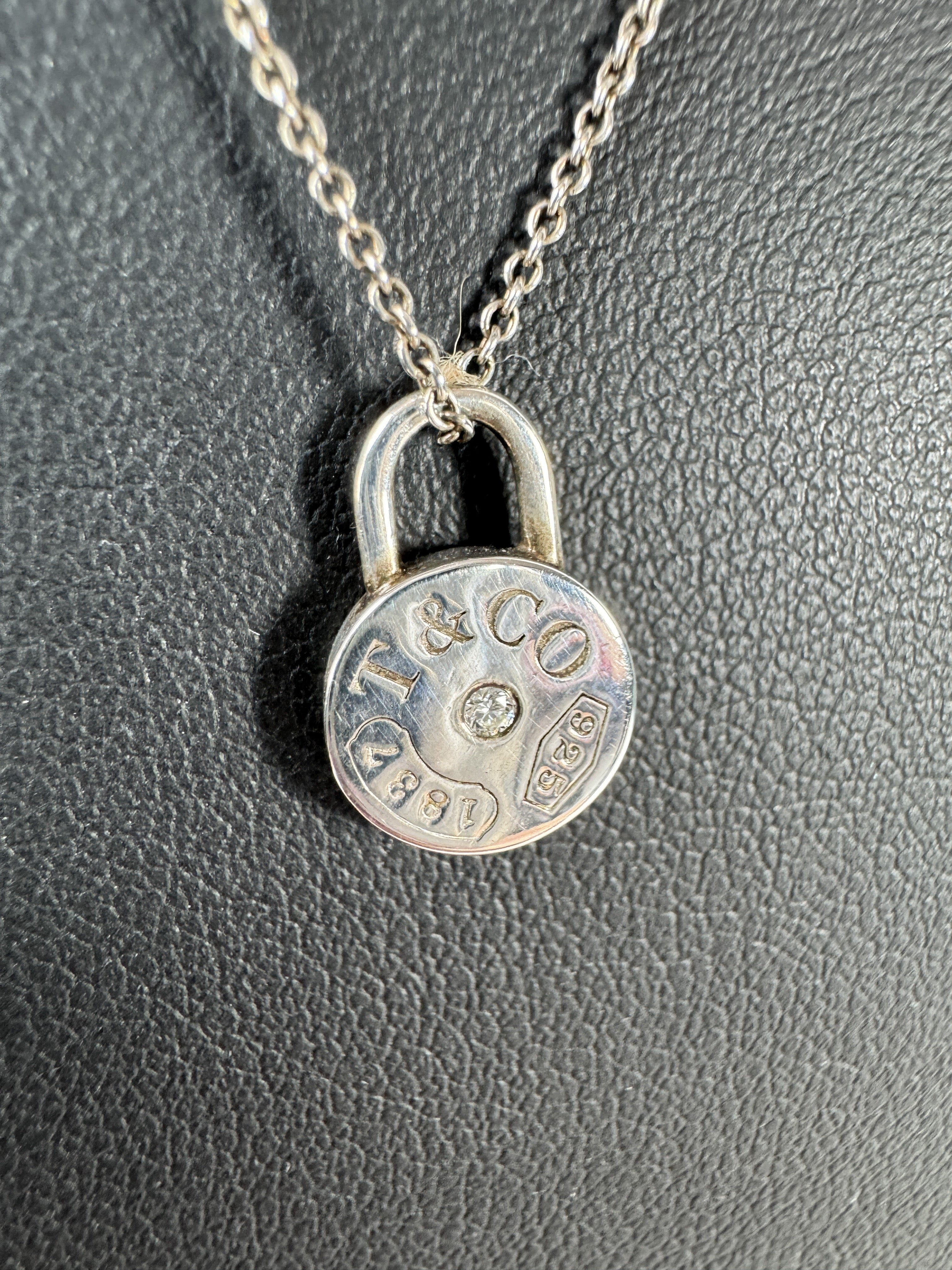 Tiffany & Co sterling silver & diamond 1837 round lock necklace