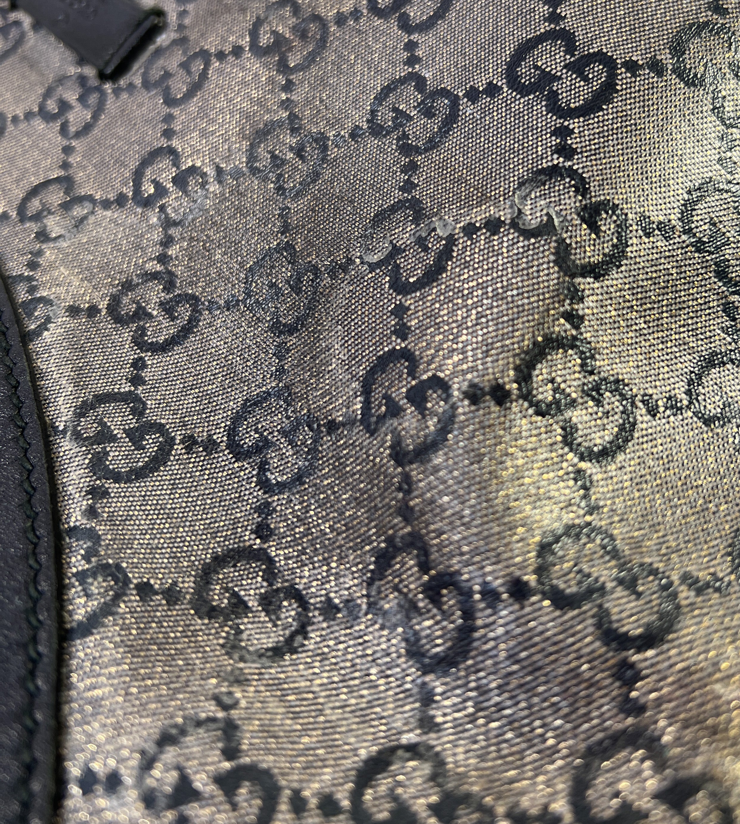 Gucci black and gold GG crossbody