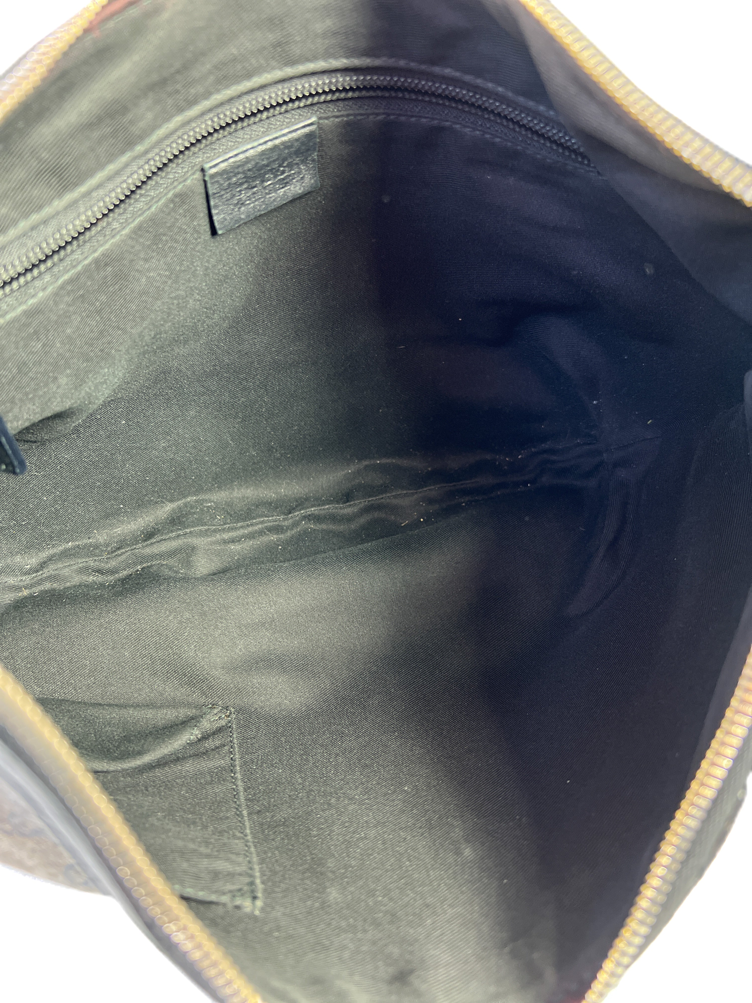 Gucci black and gold GG crossbody