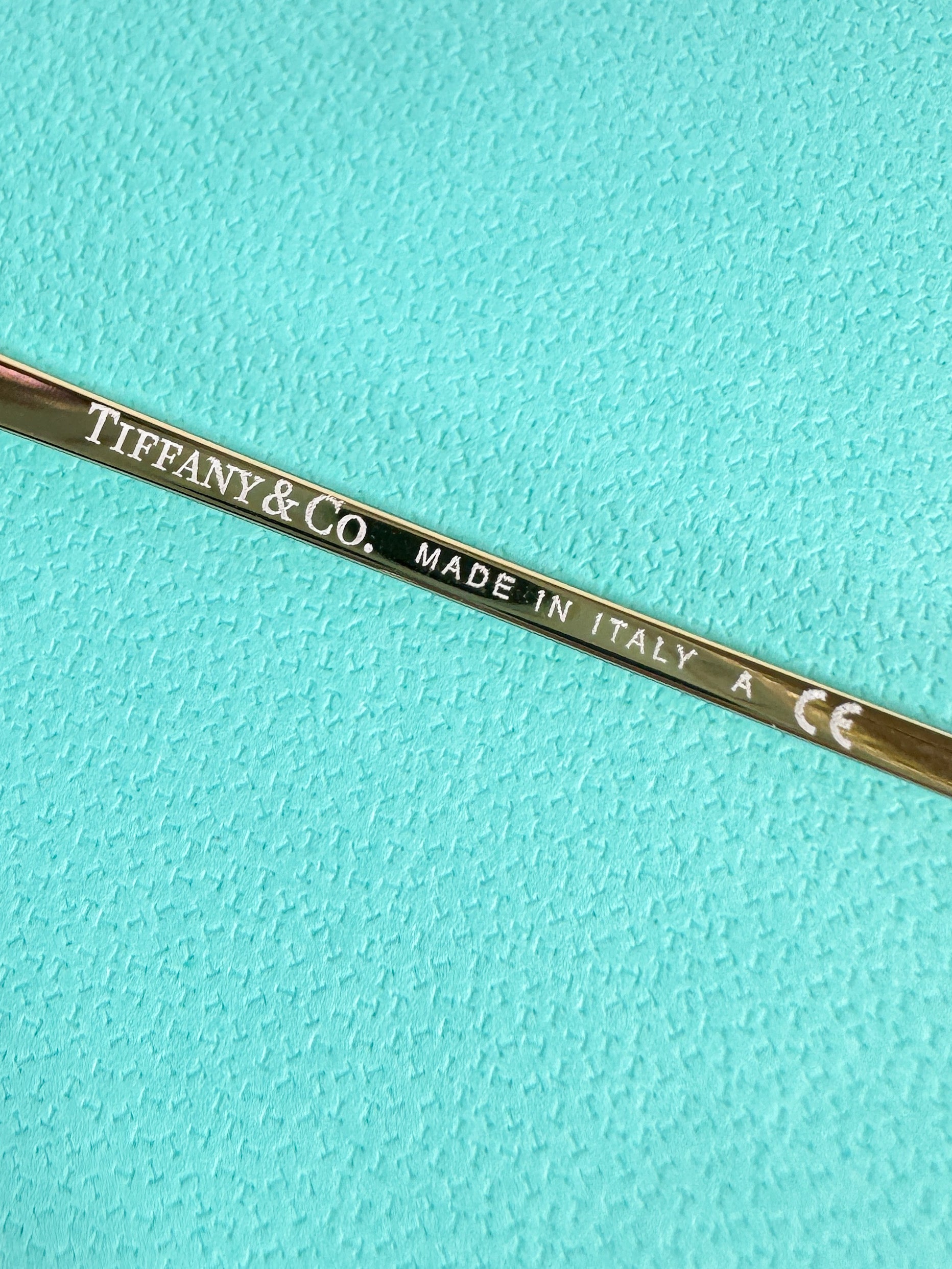 Tiffany & Co blue metallic return to aviator sunglasses TF3021