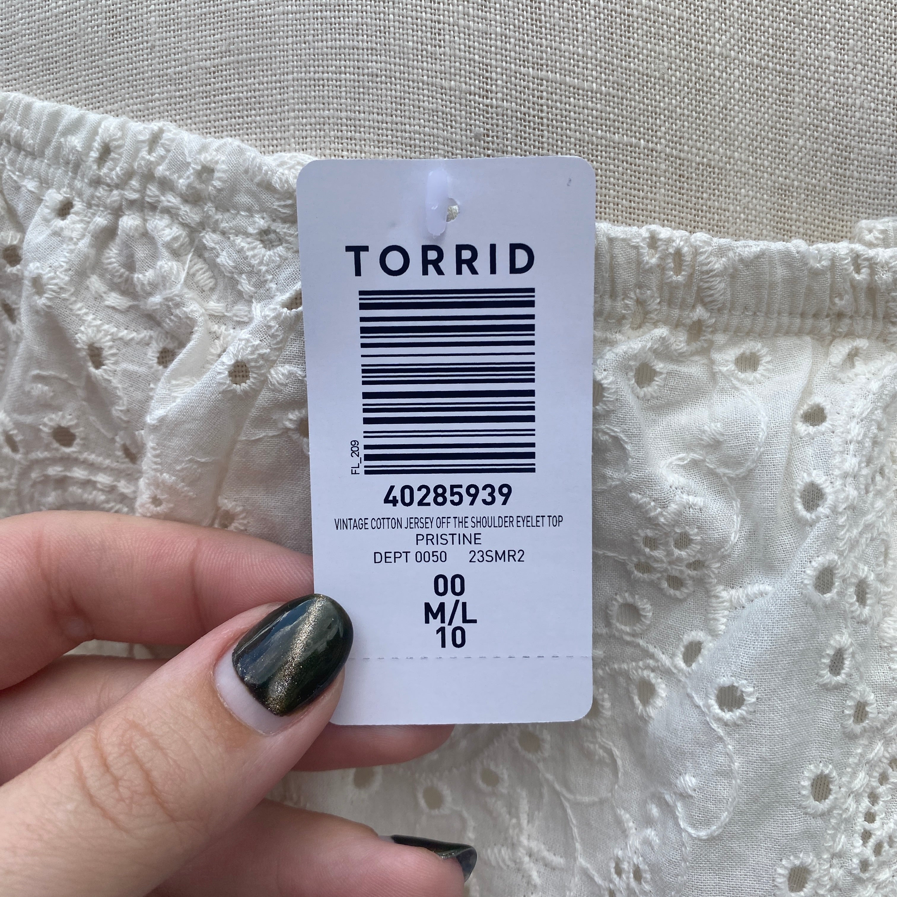 Torrid cream OTS eyelet top size M/L NWT