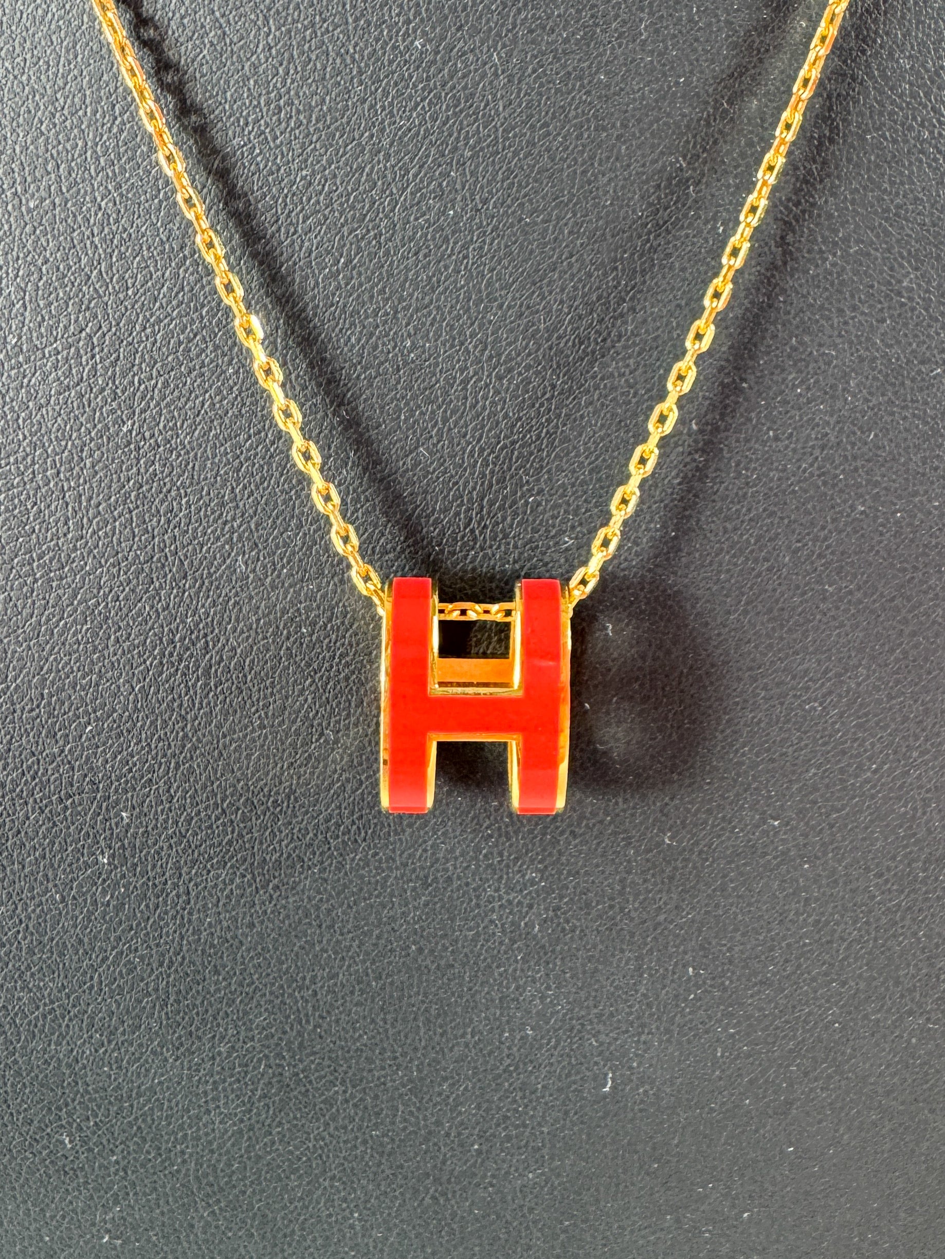 Hermès gold tone pink (rose extreme) enamel pop H pendant necklace