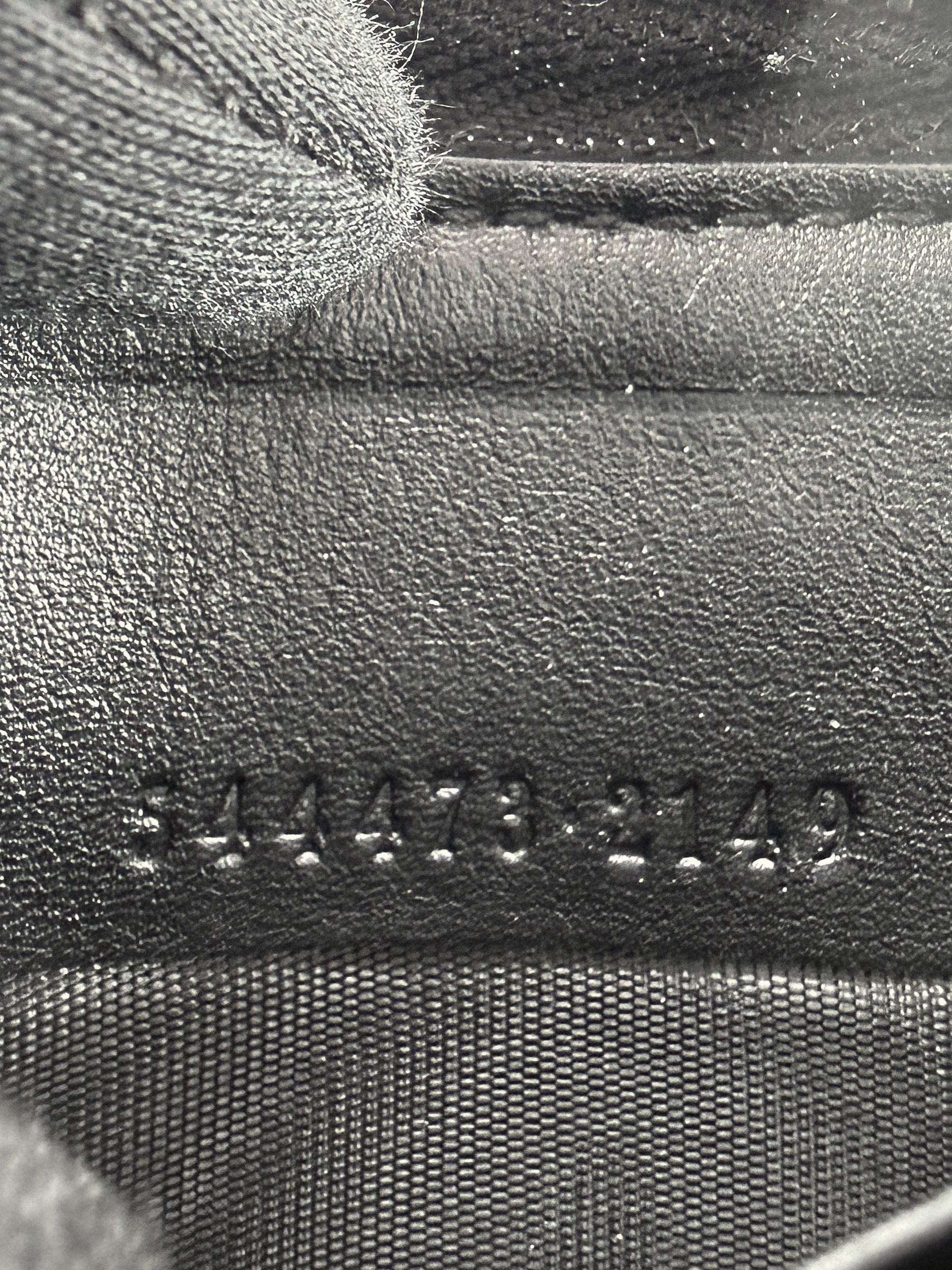 Gucci black GG Microguccissima zip wallet 544473-2149