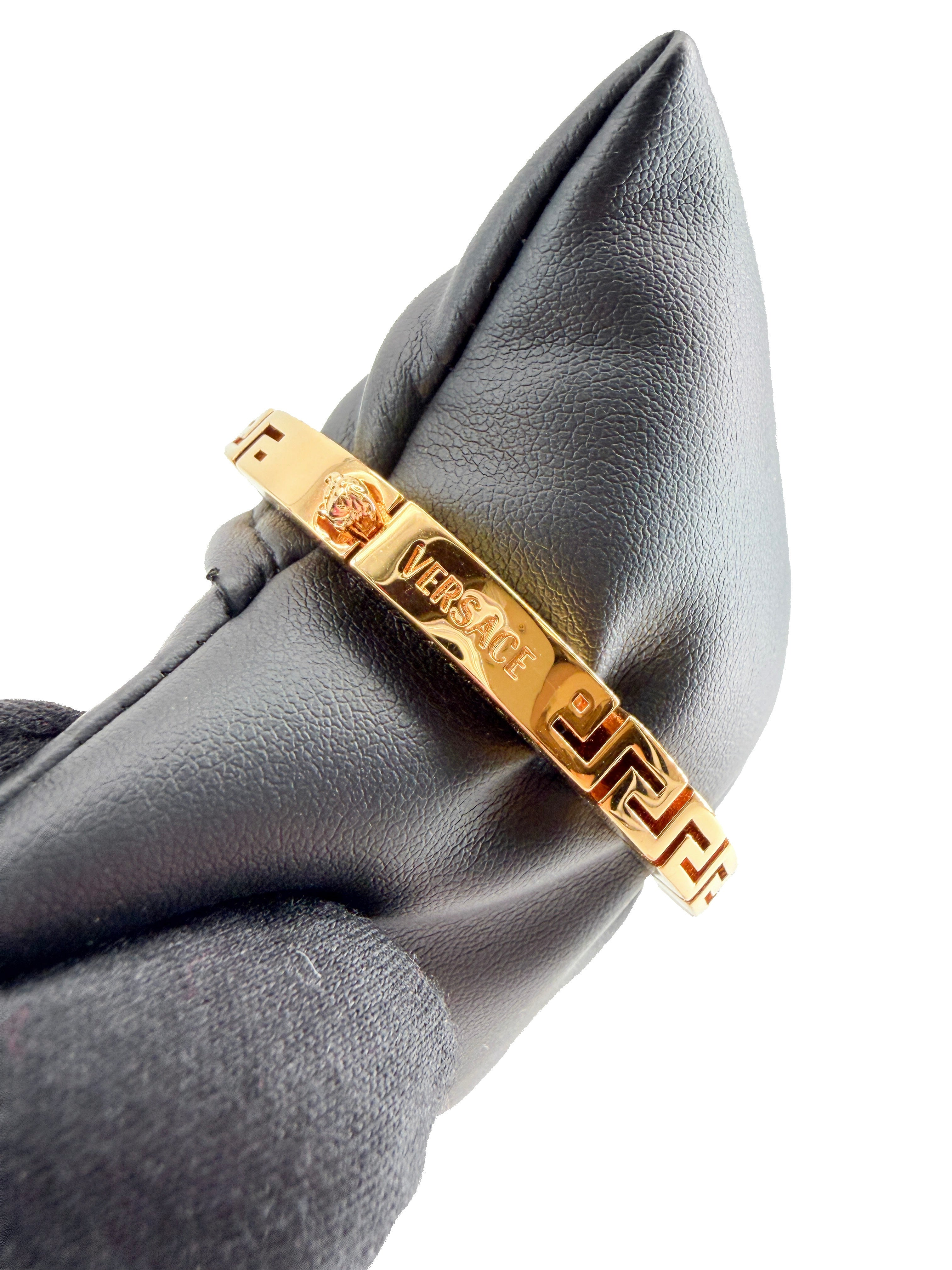 Versace gold tone Greca hinged bangle