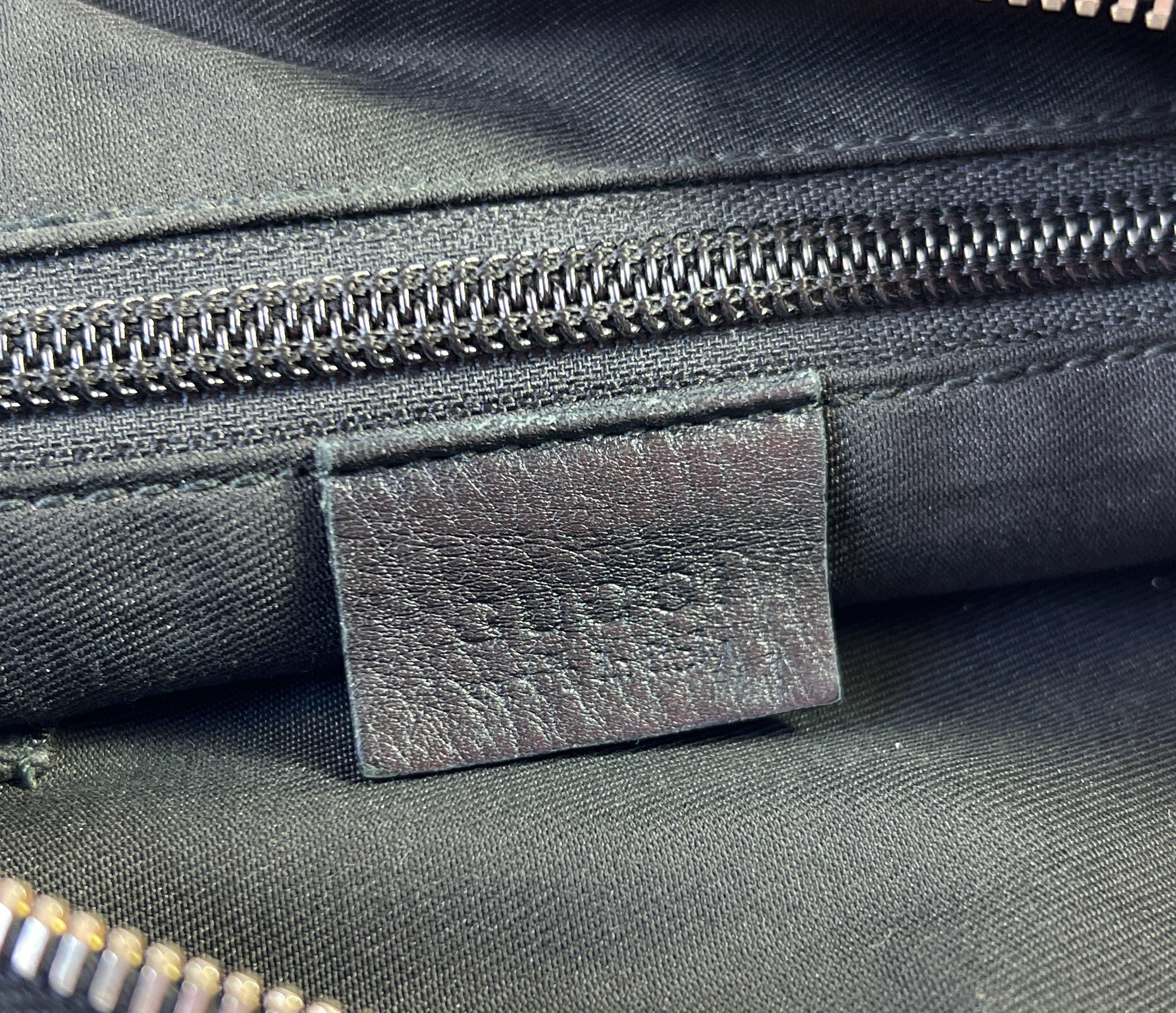 Gucci black and gold GG crossbody