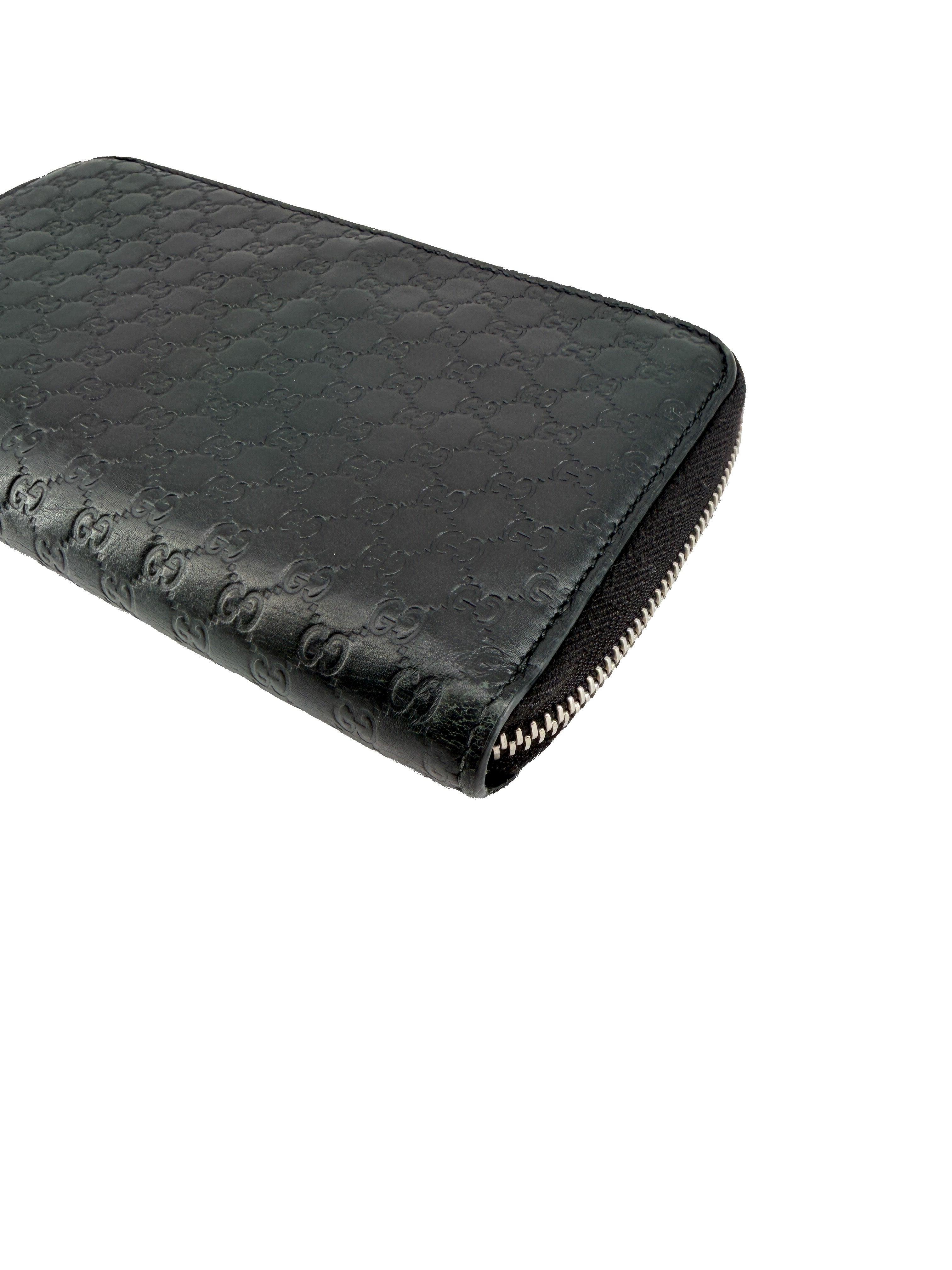 Gucci black GG Microguccissima zip wallet 544473-2149