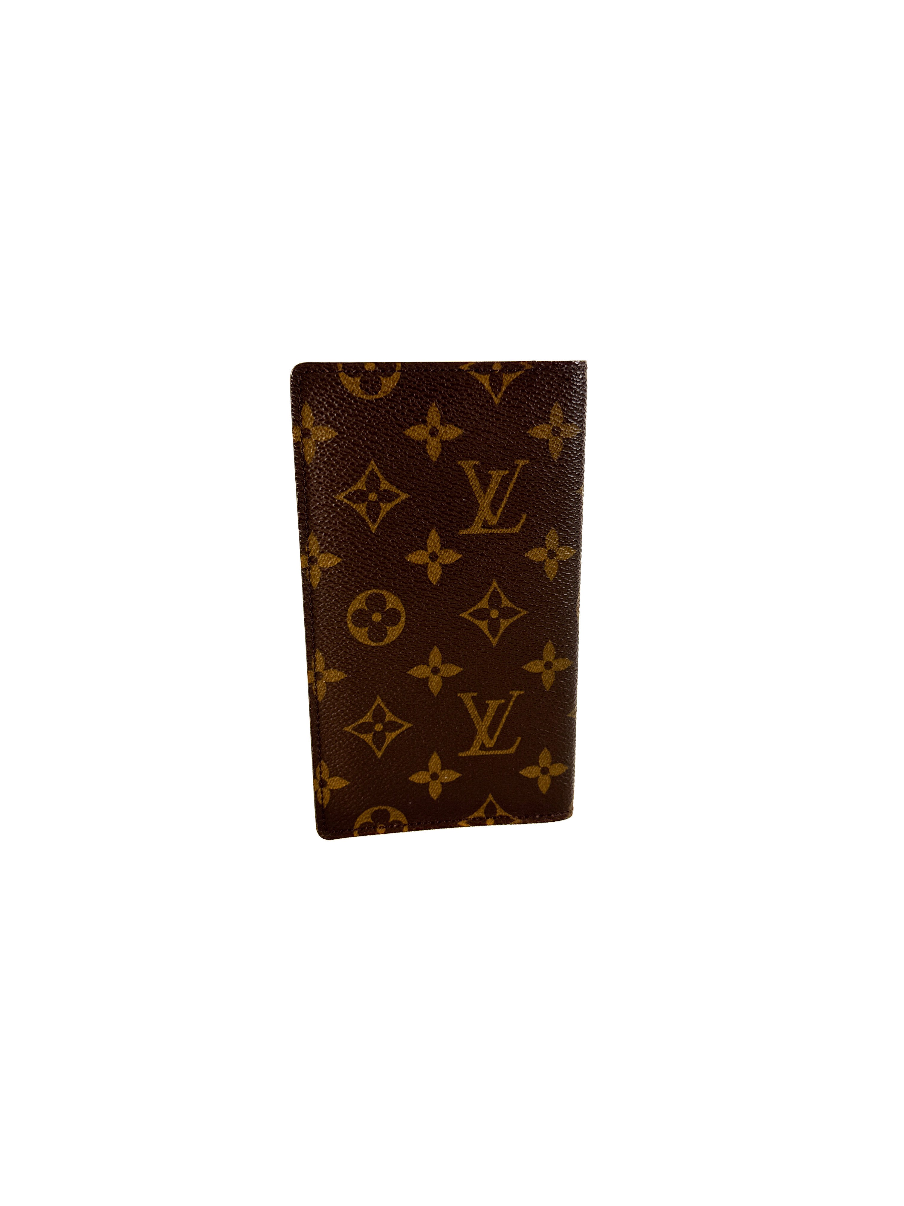 Louis Vuitton monogram vertical wallet CA0060