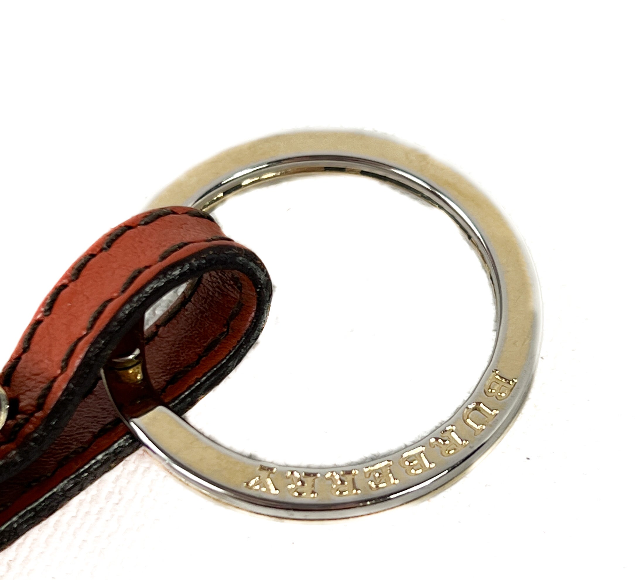 Burberry orange leather tassel keychain