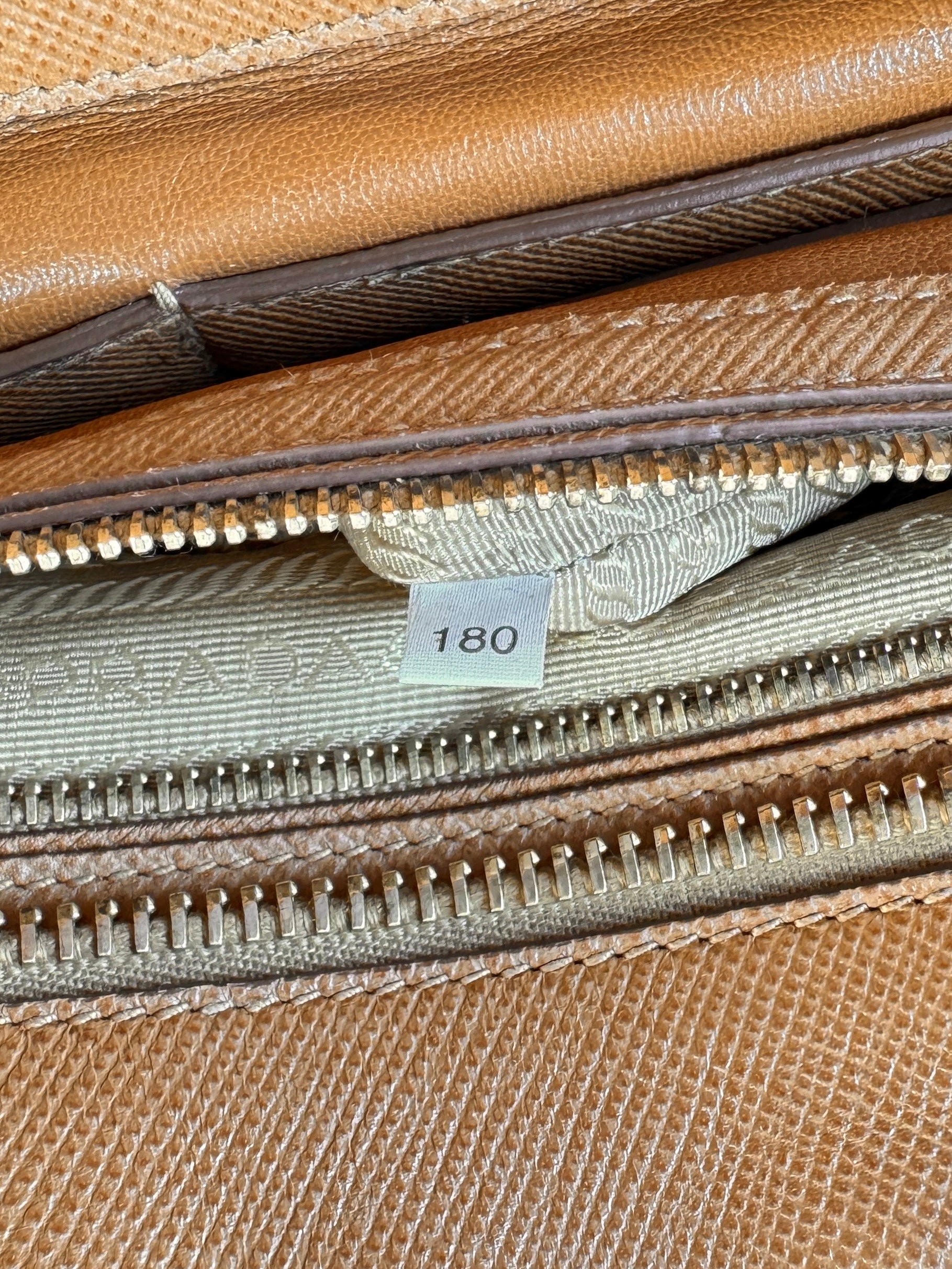 Prada brown Saffiano triple zip domed satchel 180