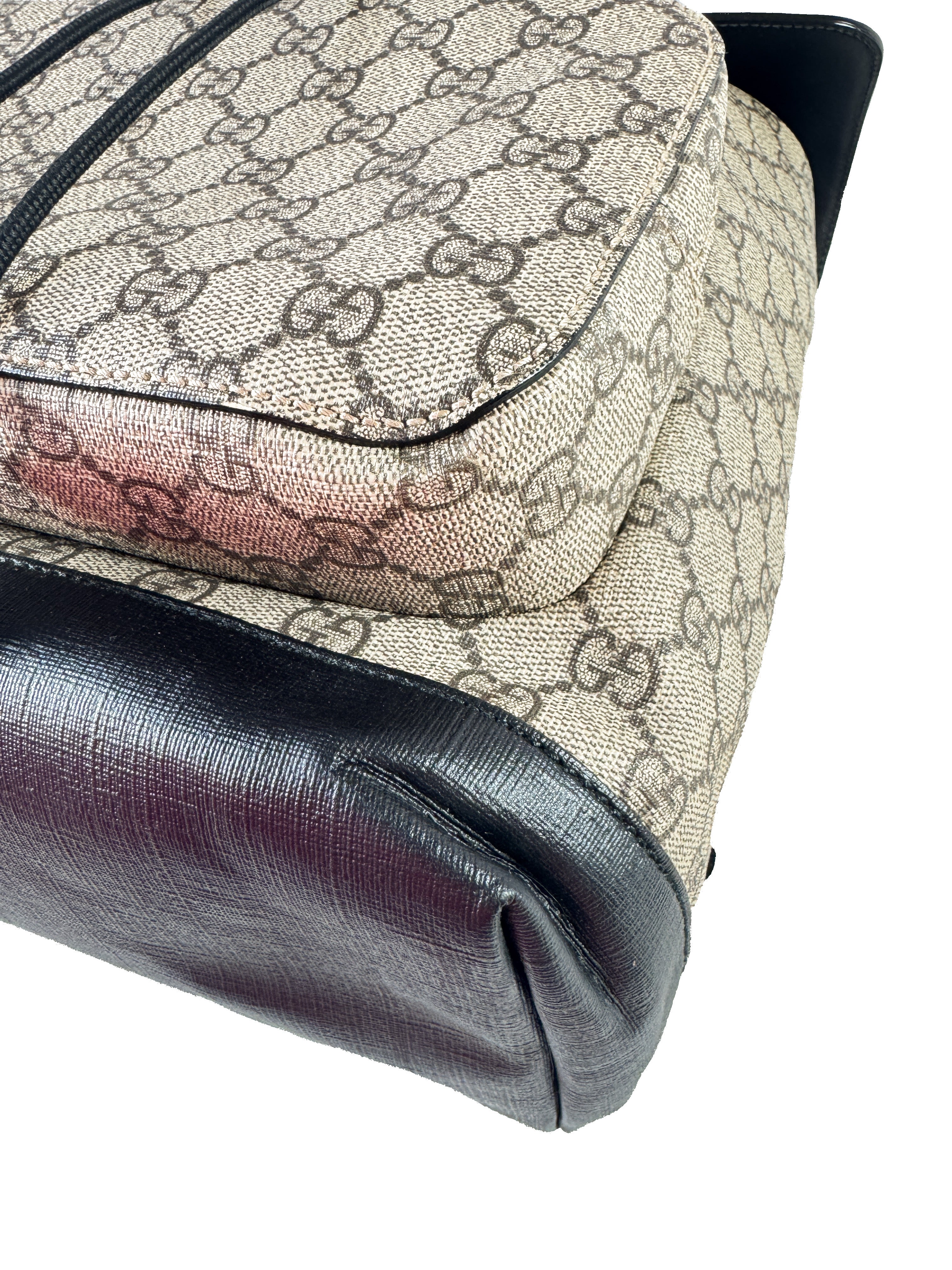 Gucci GG Supreme buckle backpack