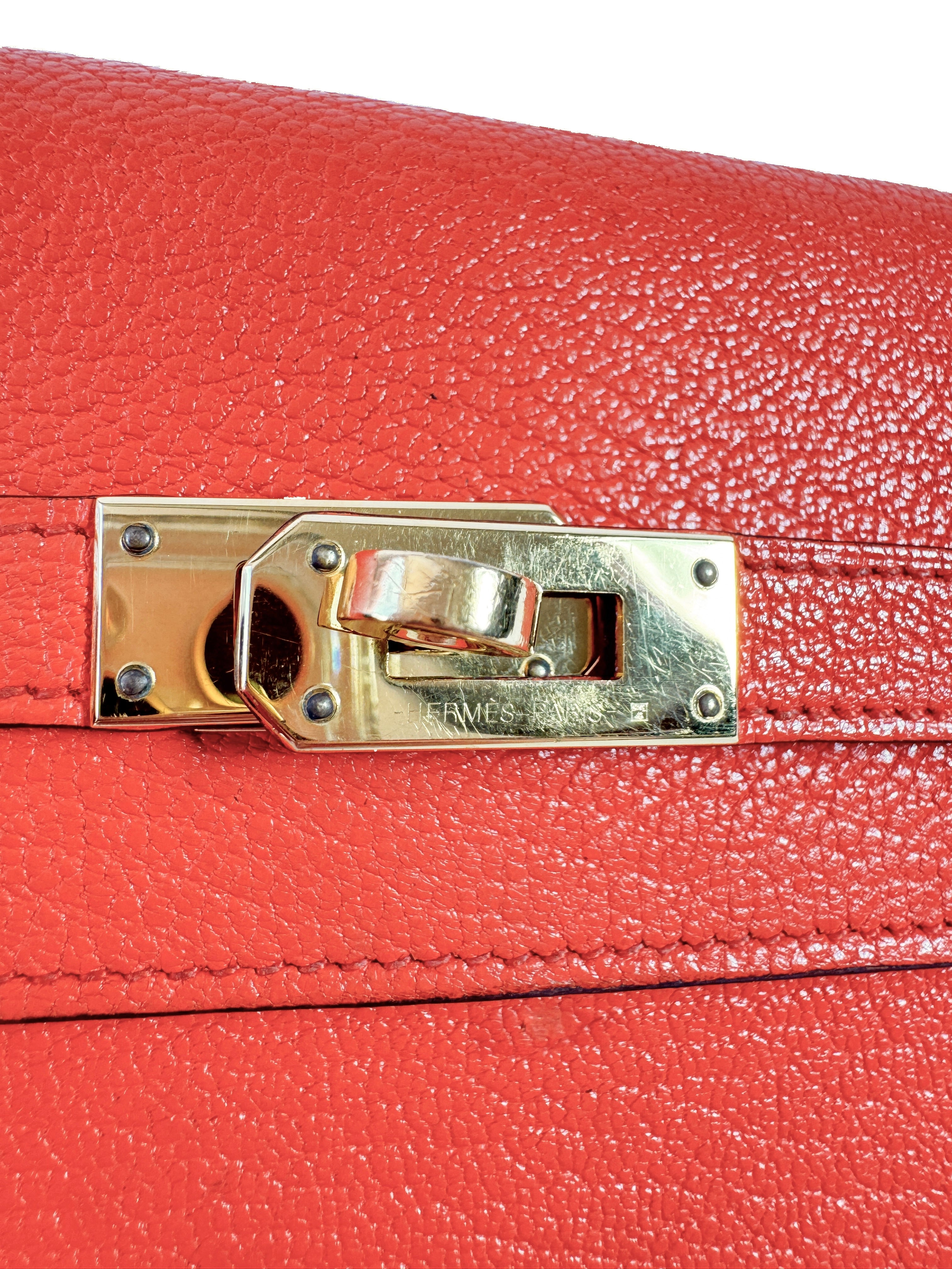 Hermès Kelly orange leather longue mysore wallet A stamp