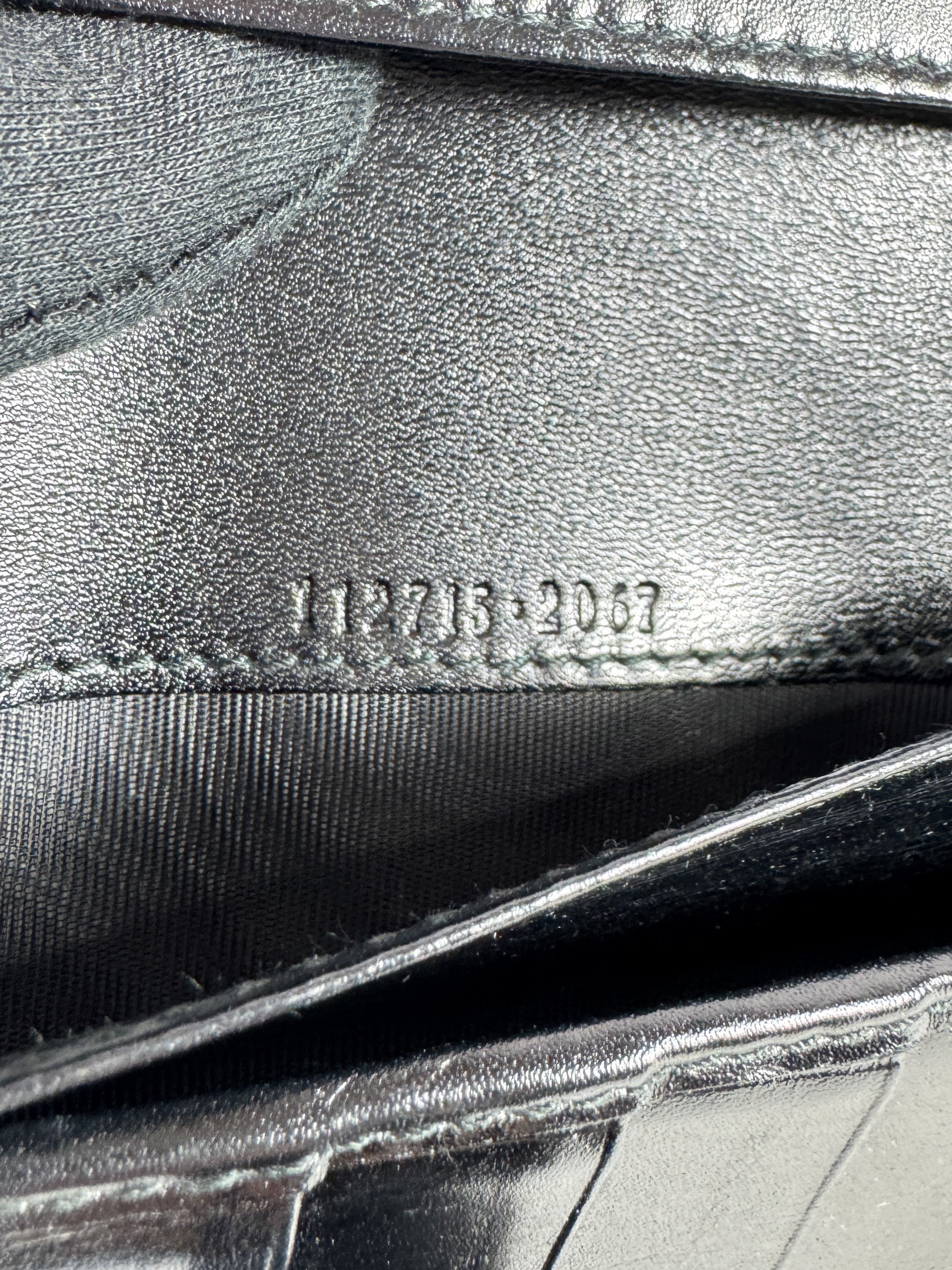 Gucci black embossed leather wallet 2067