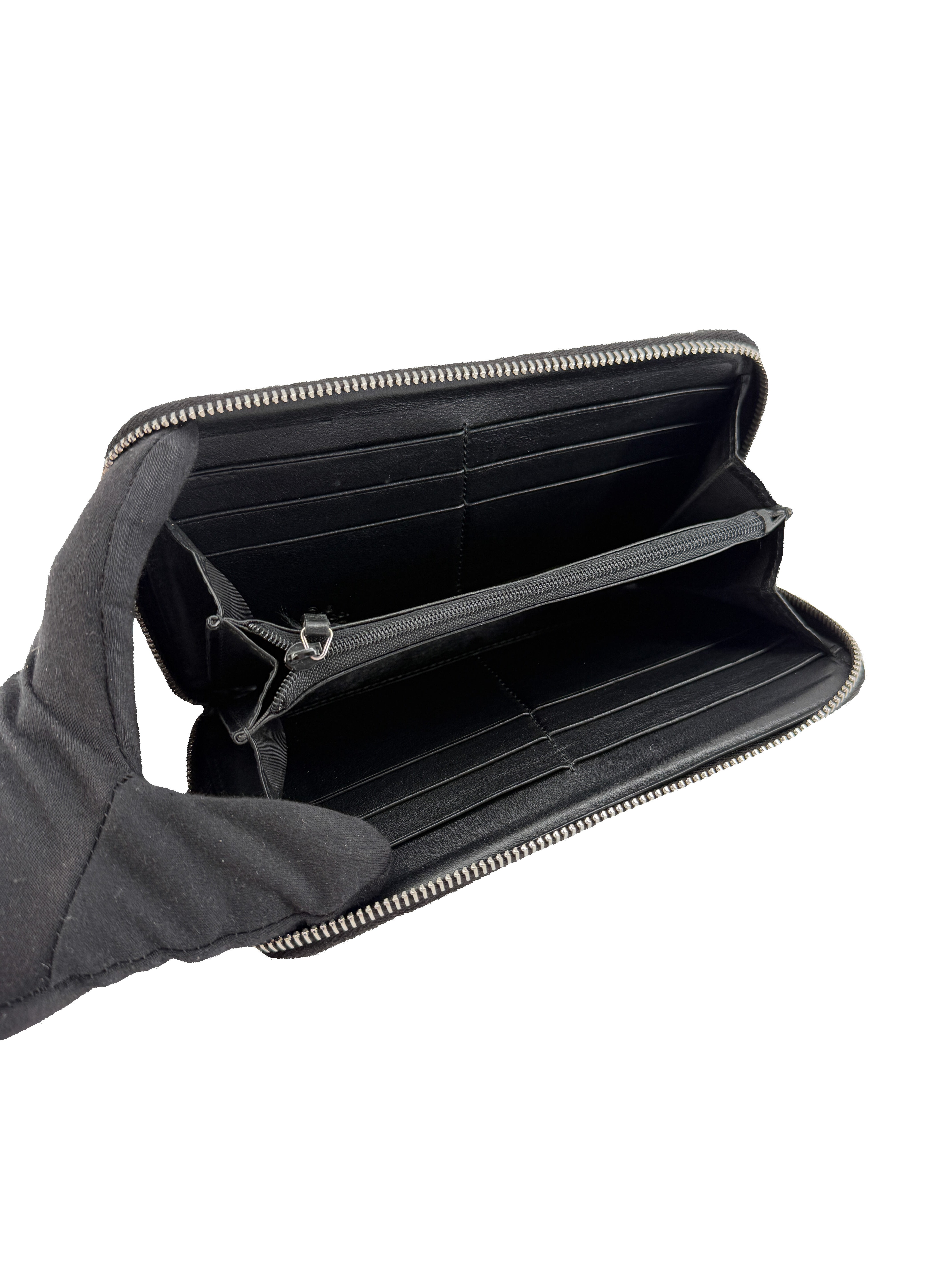 Gucci black GG Microguccissima zip wallet 544473-2149