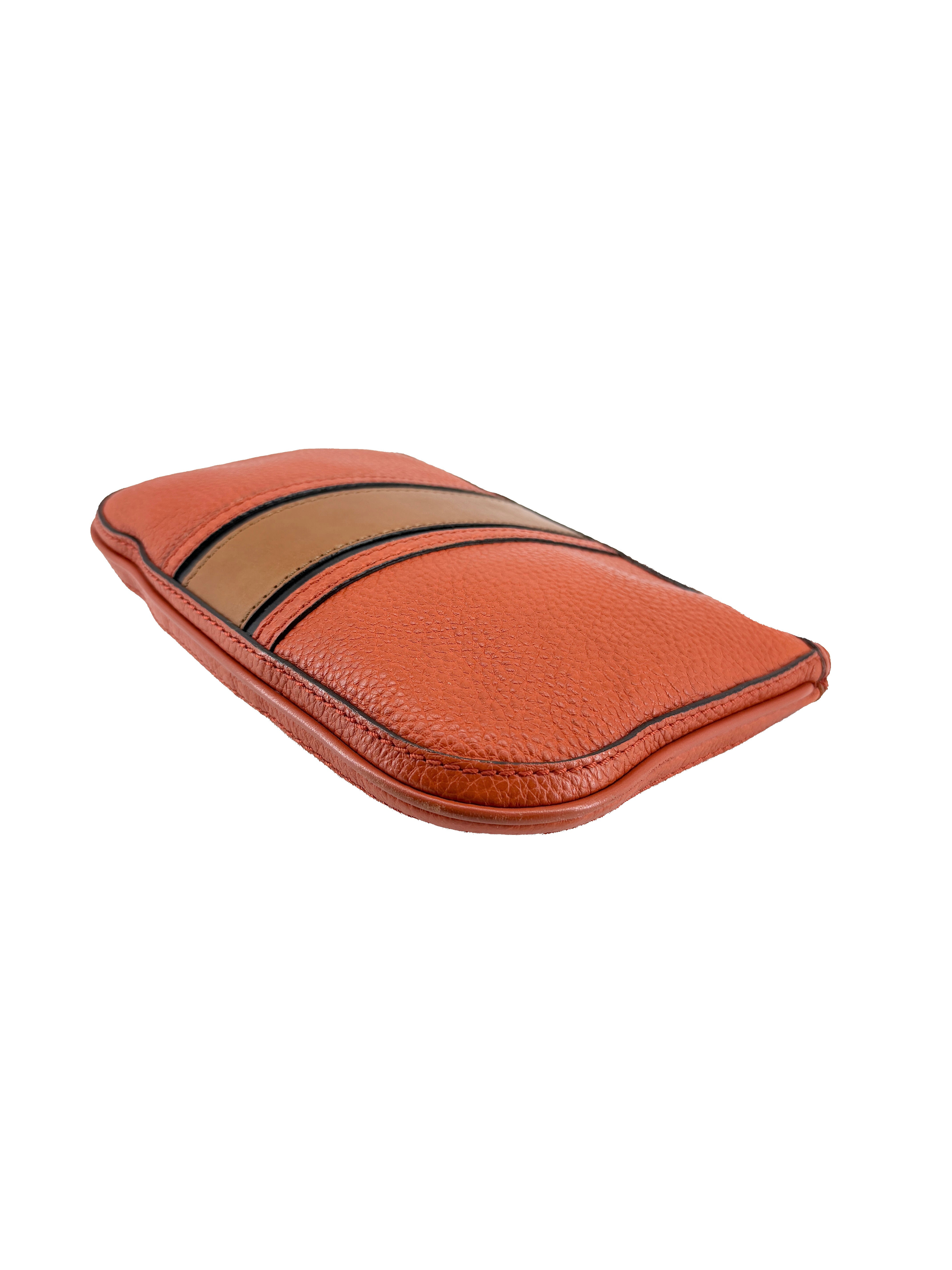 Burberry orange leather wristlet