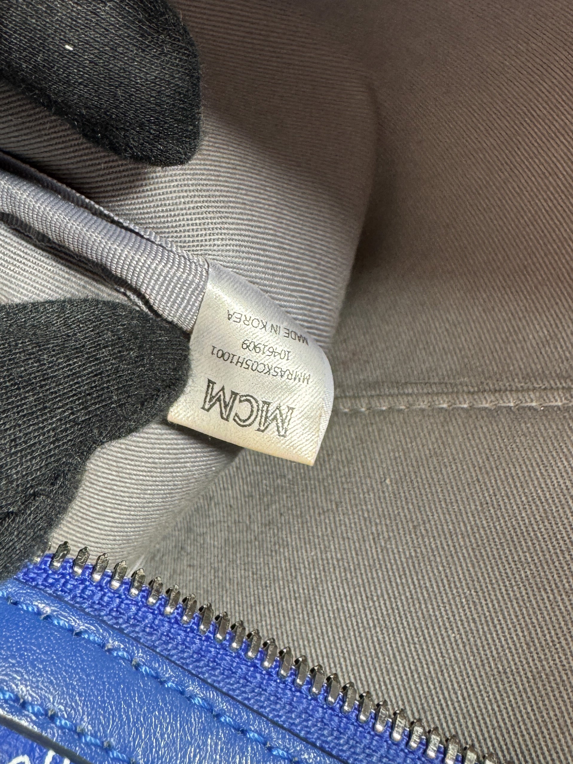 MCM blue Ottomar toiletry bag