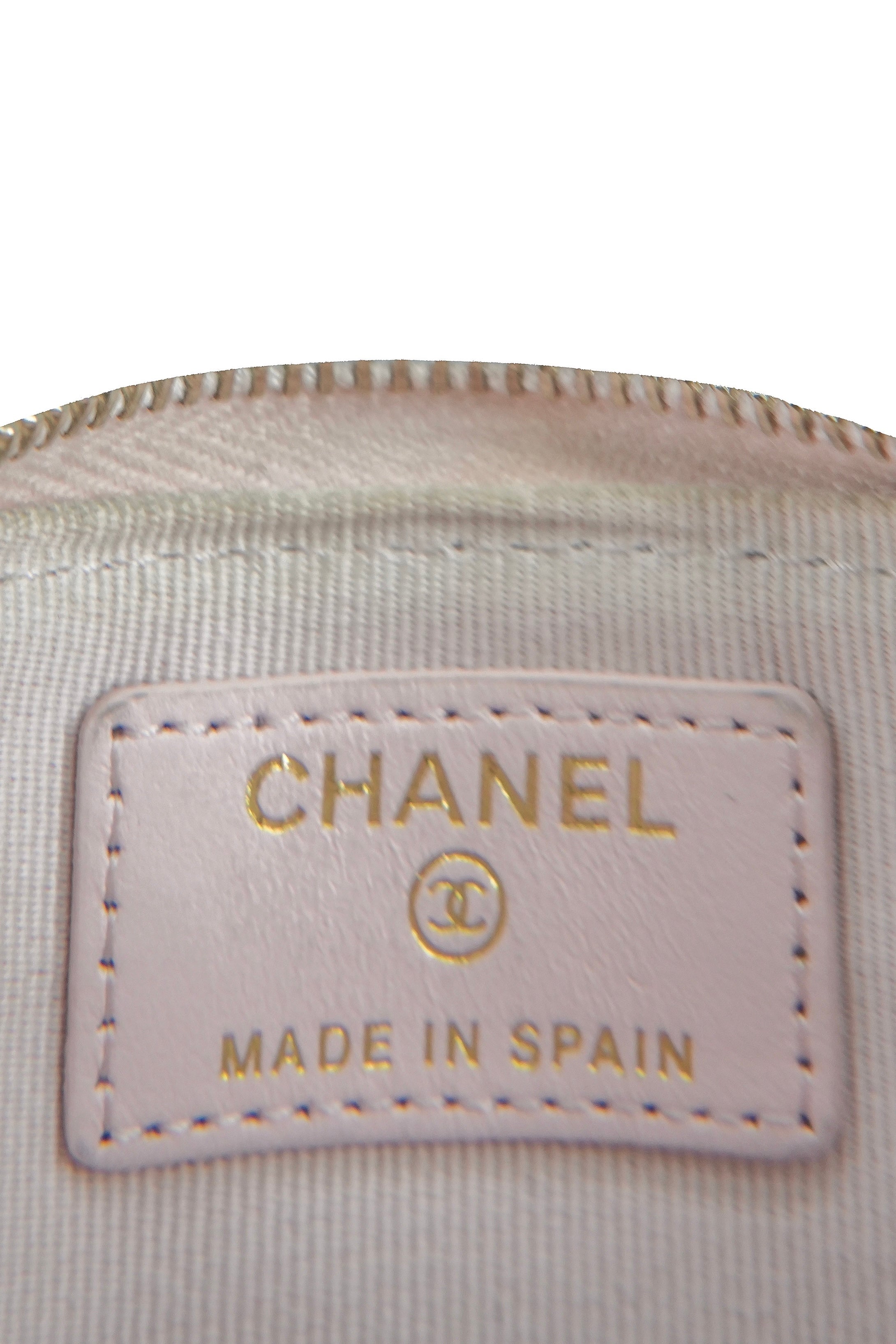 Chanel light pink quilted square zip around wallet 32075634