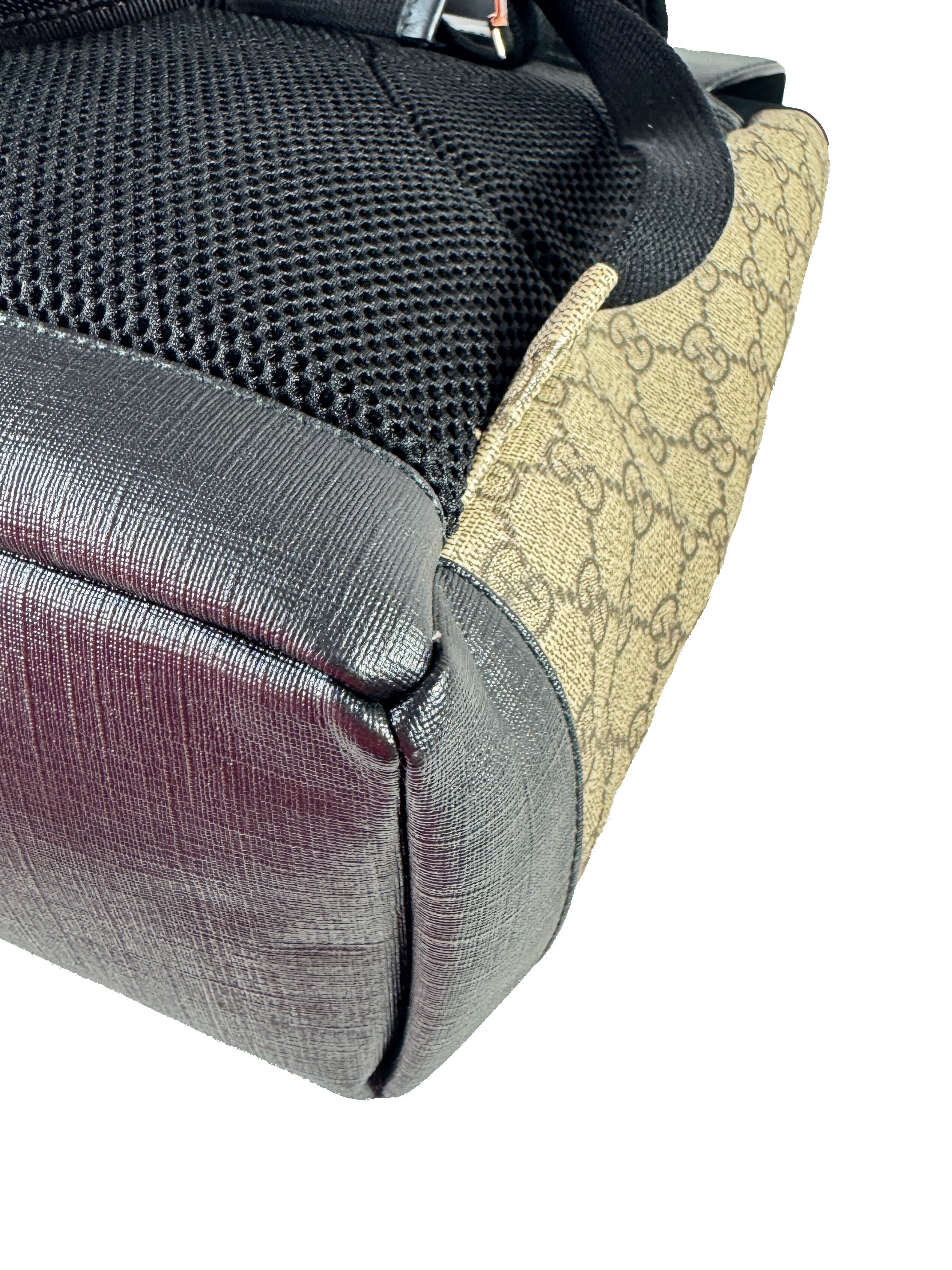 Gucci GG Supreme buckle backpack