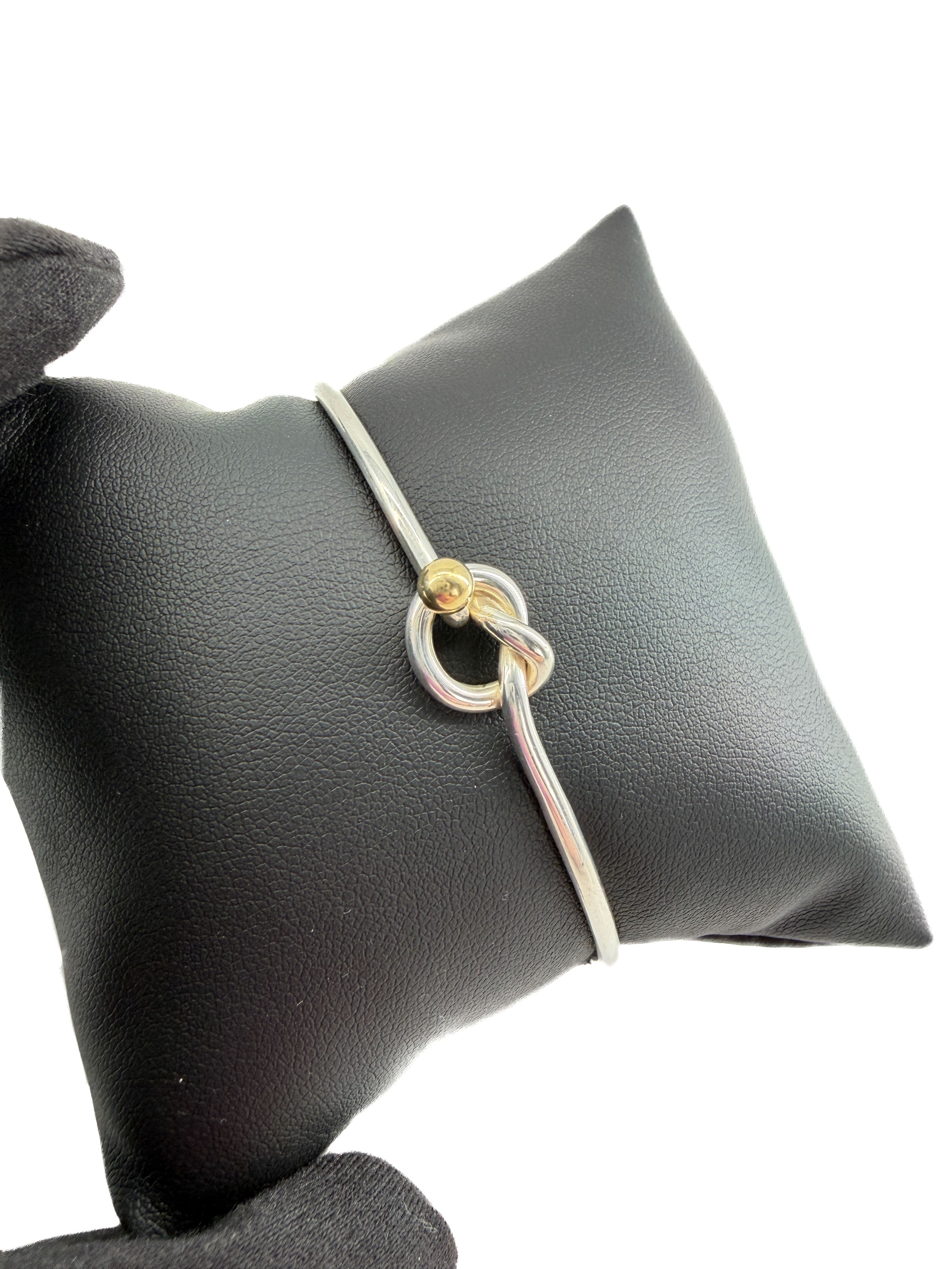 Tiffany & Co sterling silver, 18k yellow gold love knot bangle