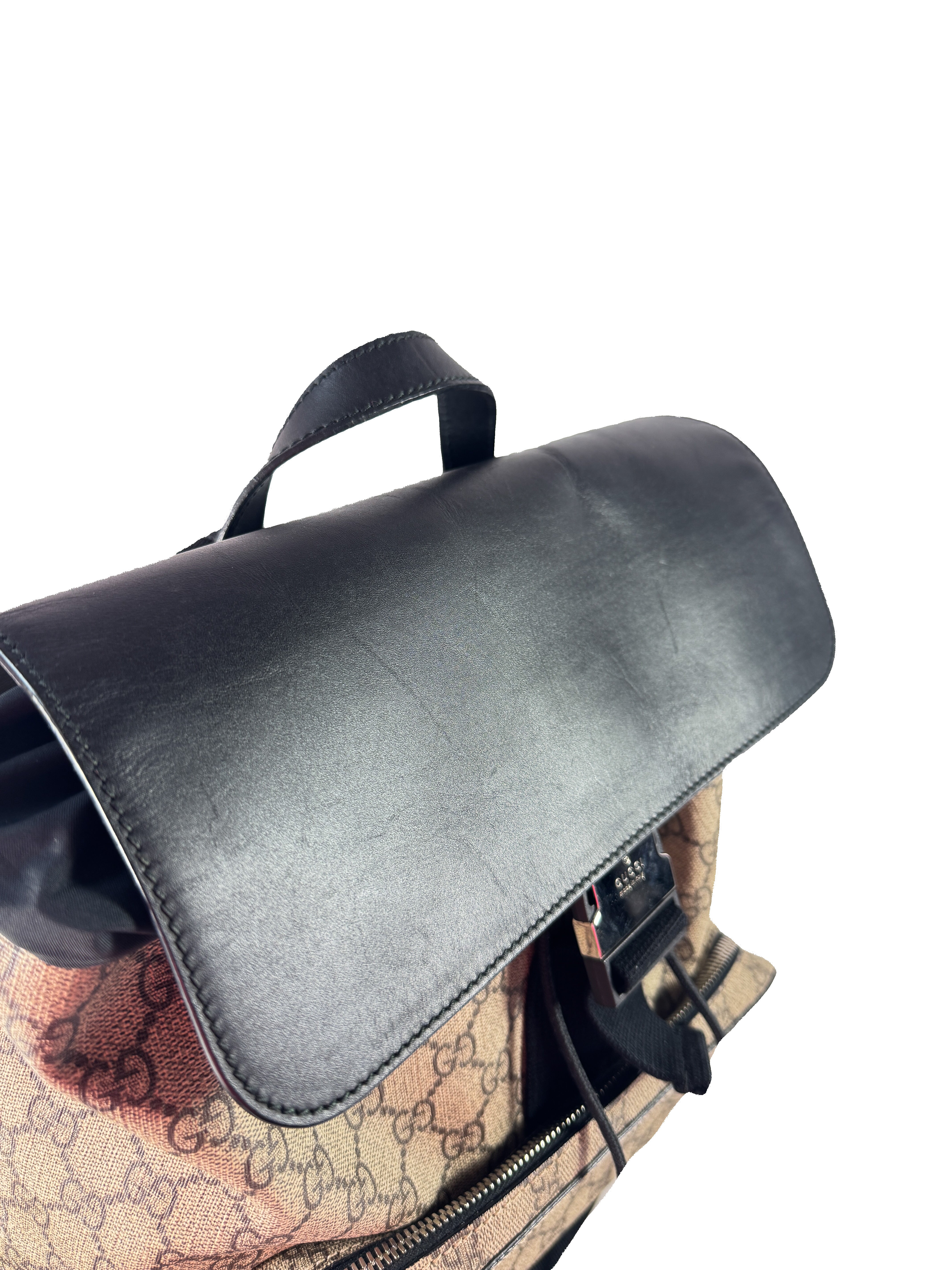 Gucci GG Supreme buckle backpack