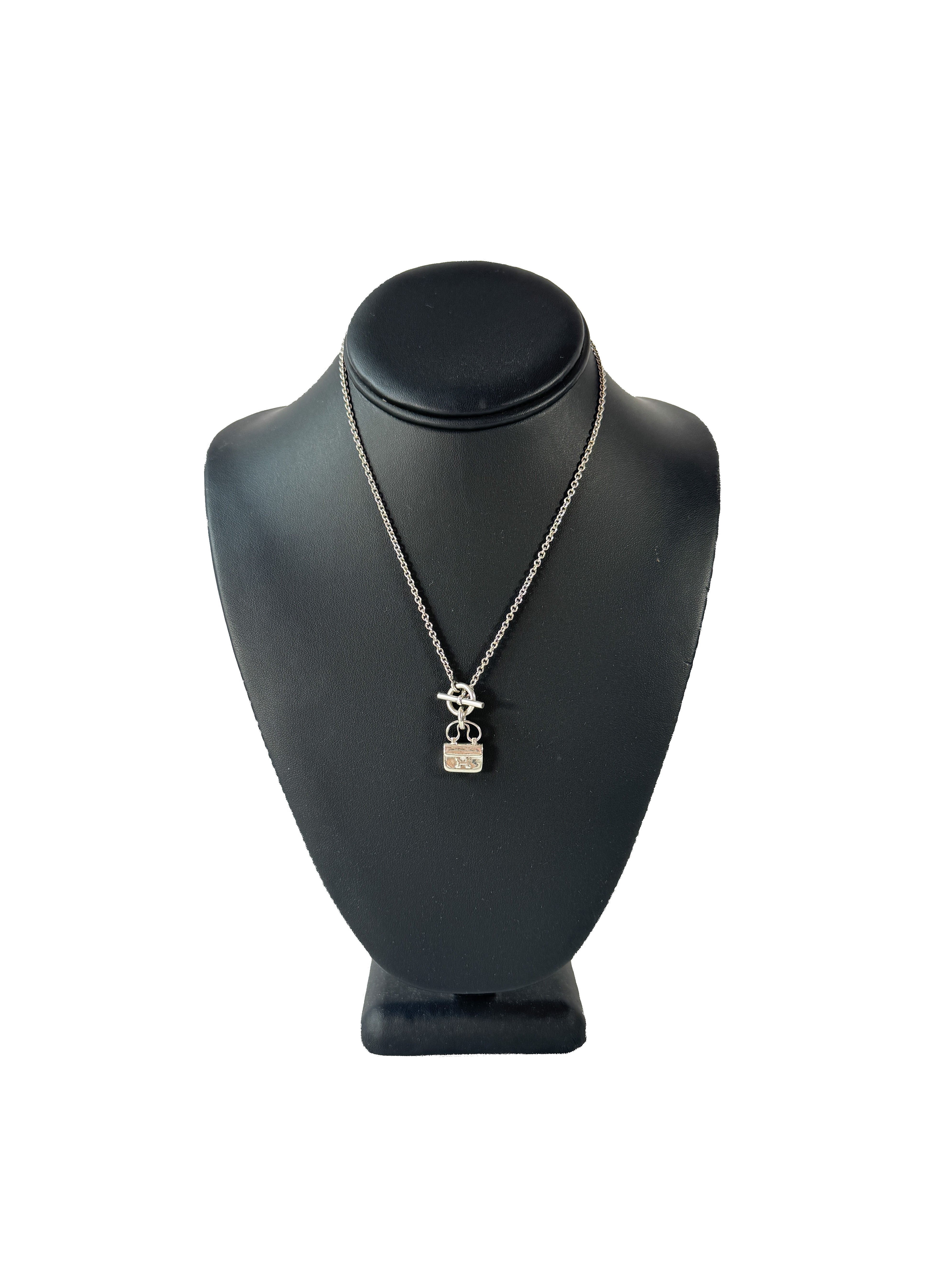 Hermès sterling silver constance amulet necklace retail $980