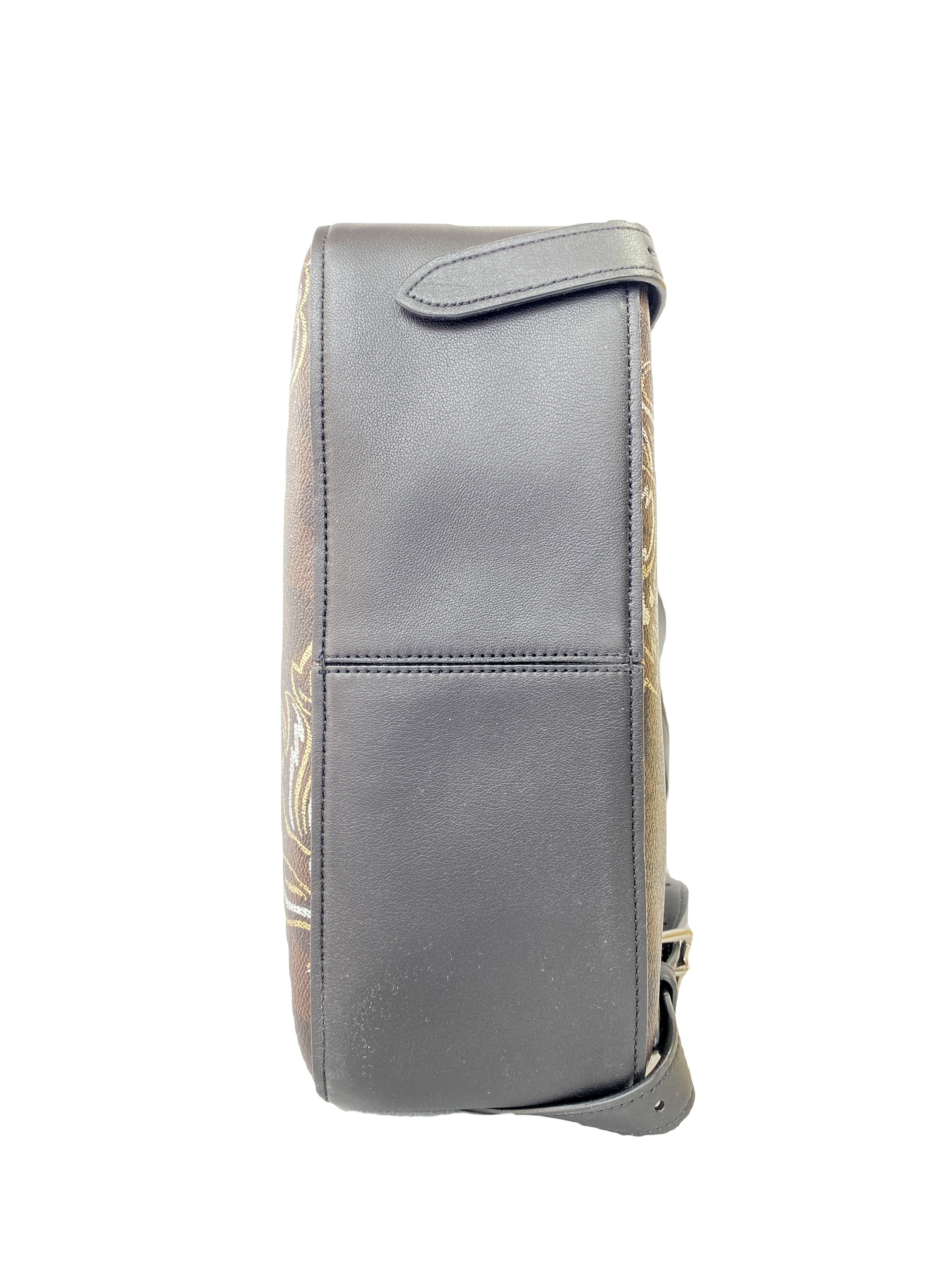 Coach black and brown signature floral backpack