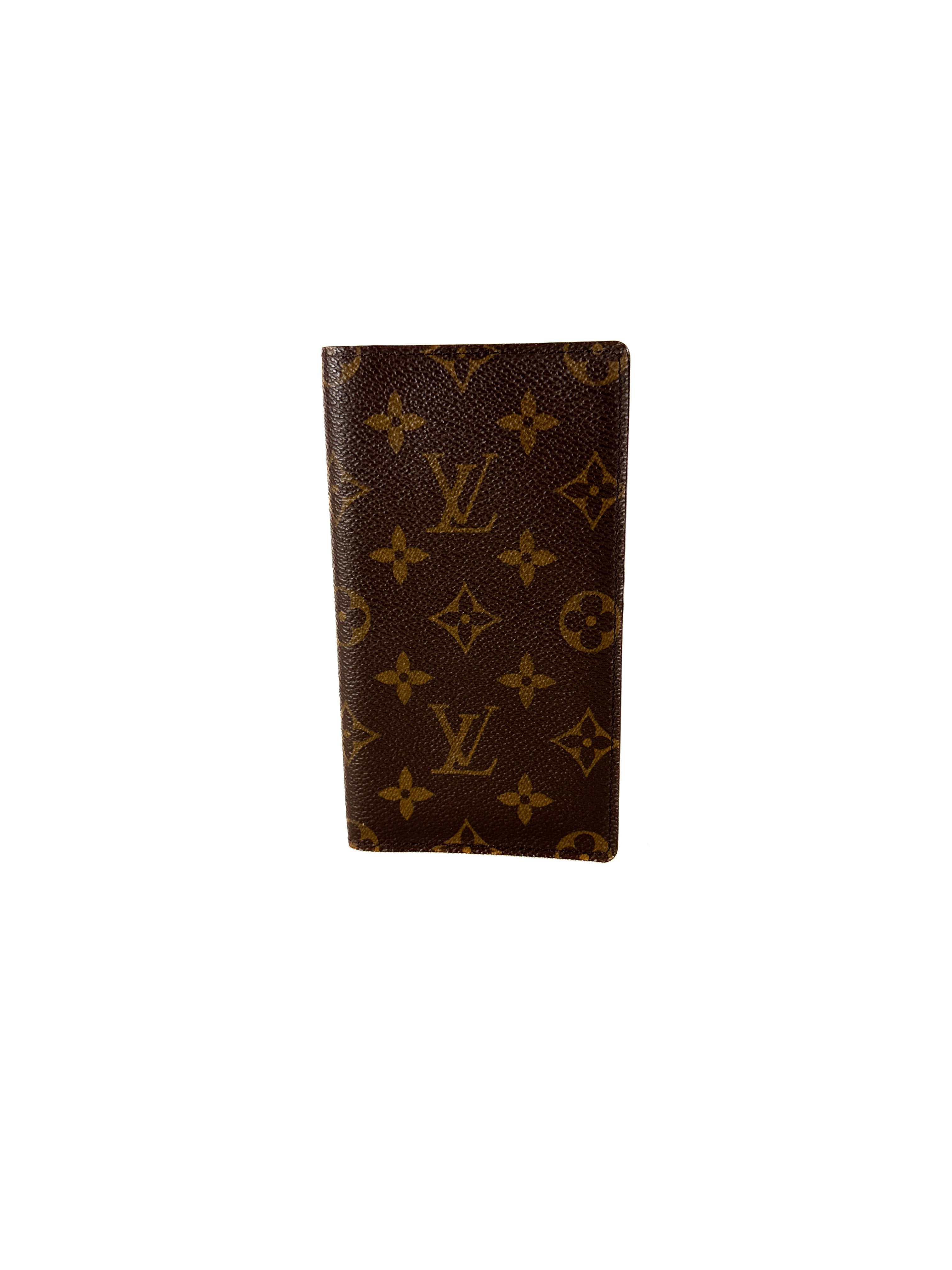 Louis Vuitton monogram vertical wallet CA0060