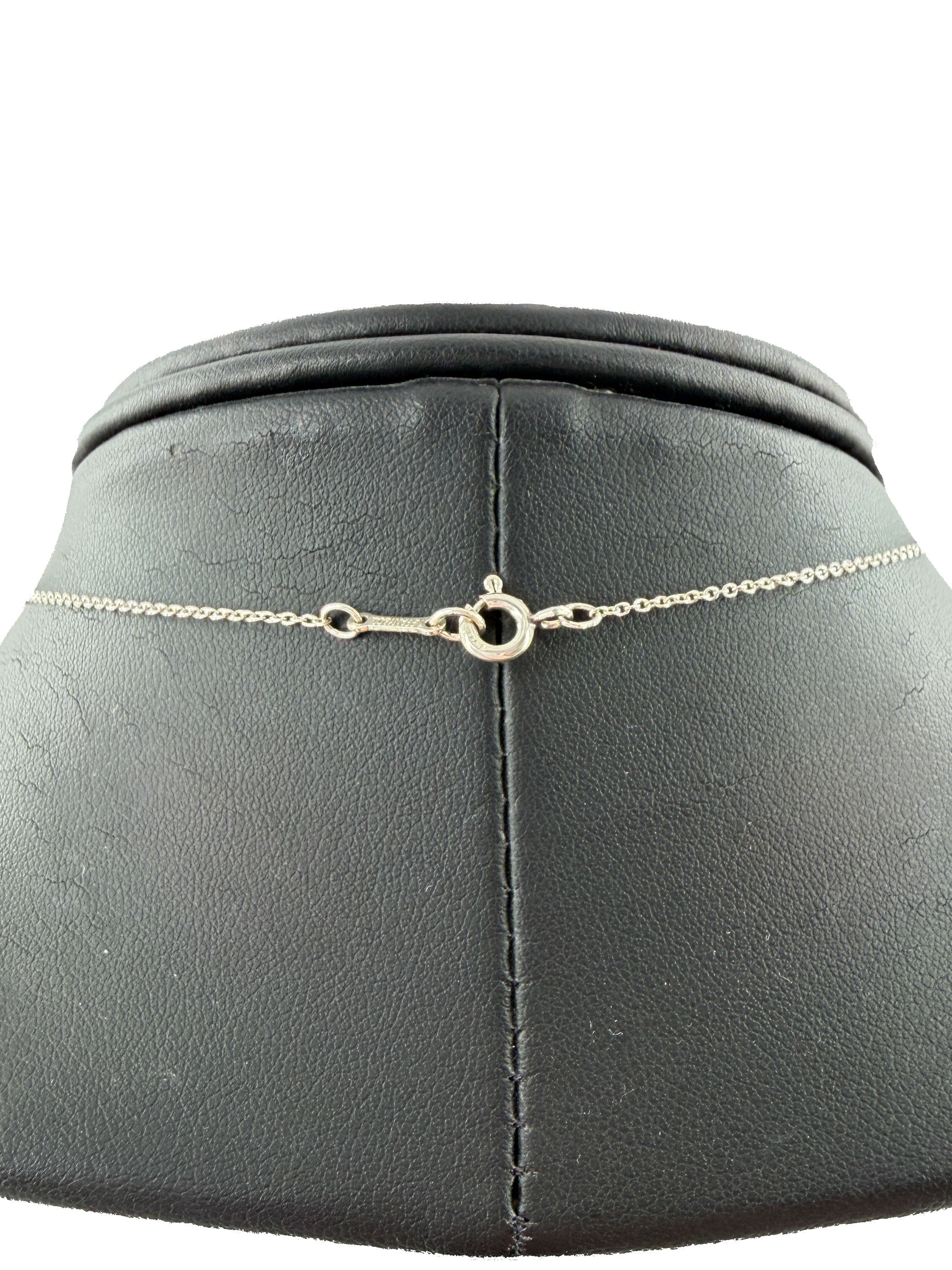 Tiffany & Co Elsa Peretti sterling silver carved heart necklace