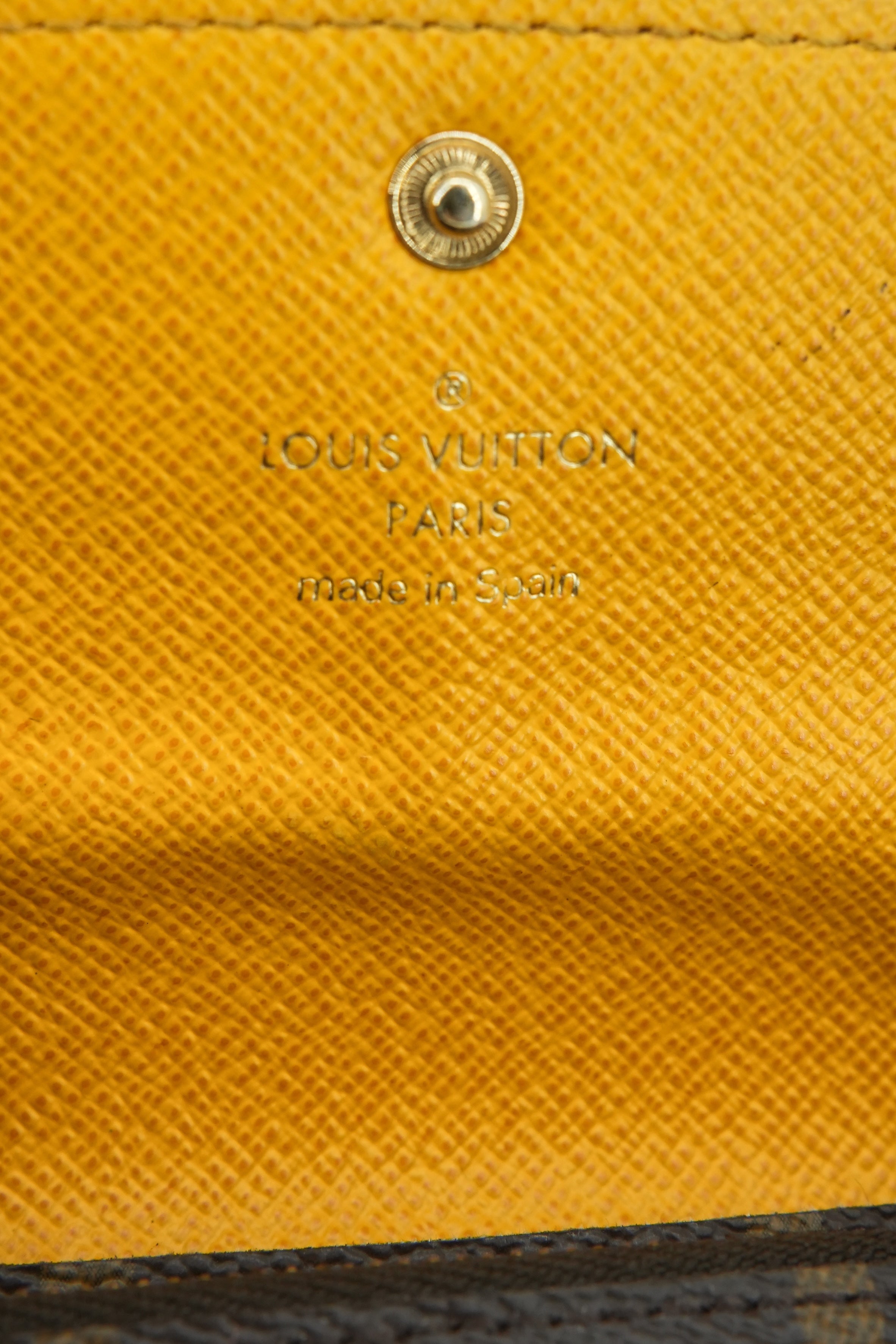 Louis Vuitton brown, yellow Emilie wallet CA4174