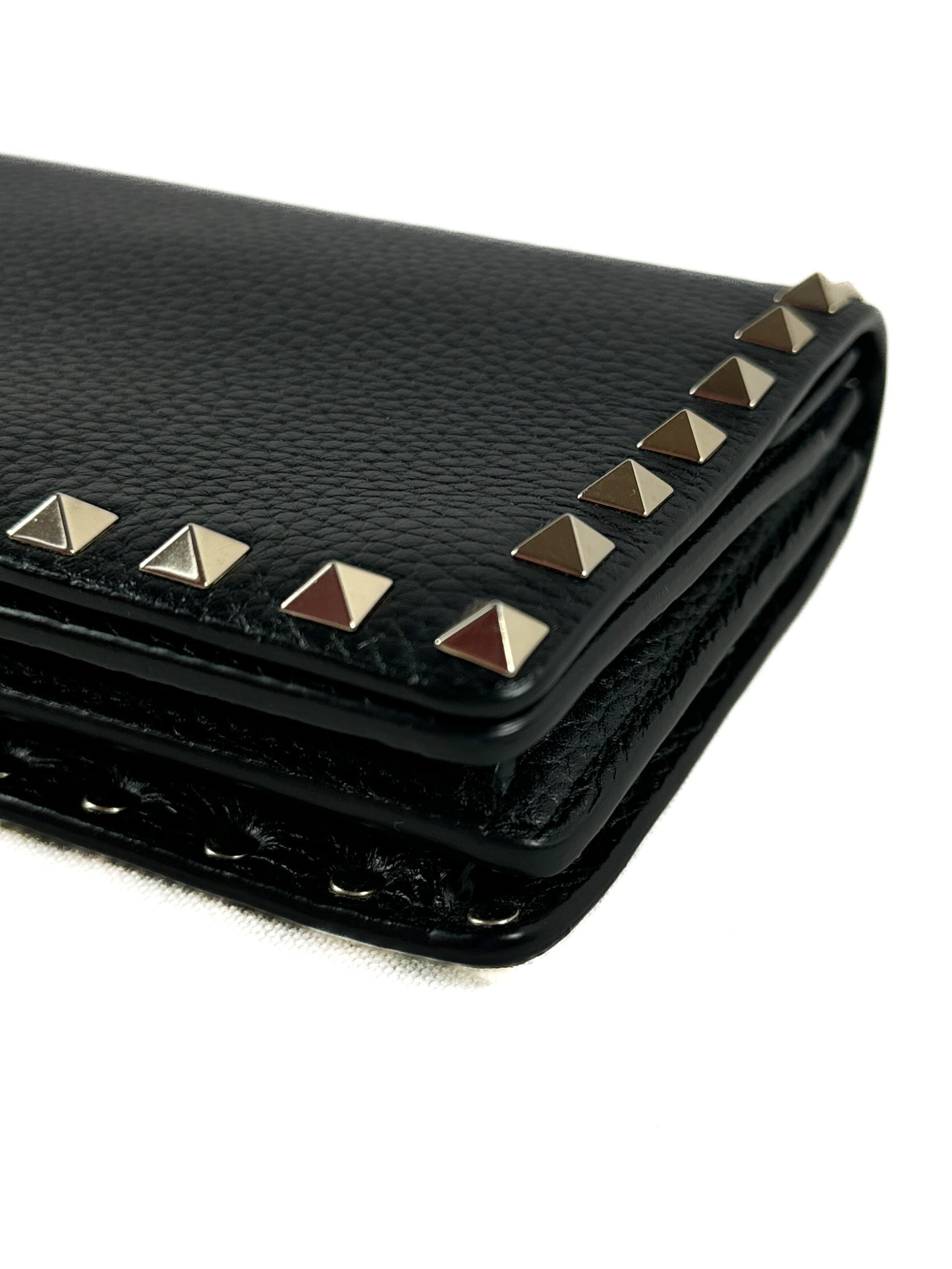 Valentino Garavani black rockstud chain pochette current retail $1180
