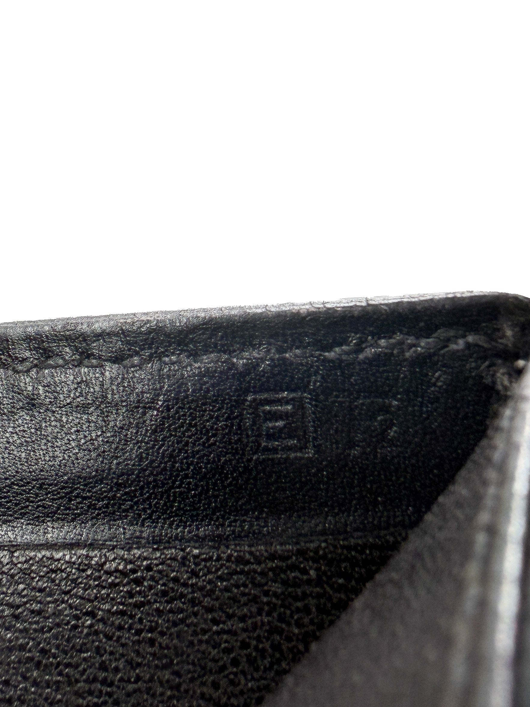 Hermès black leather bifold wallet square E