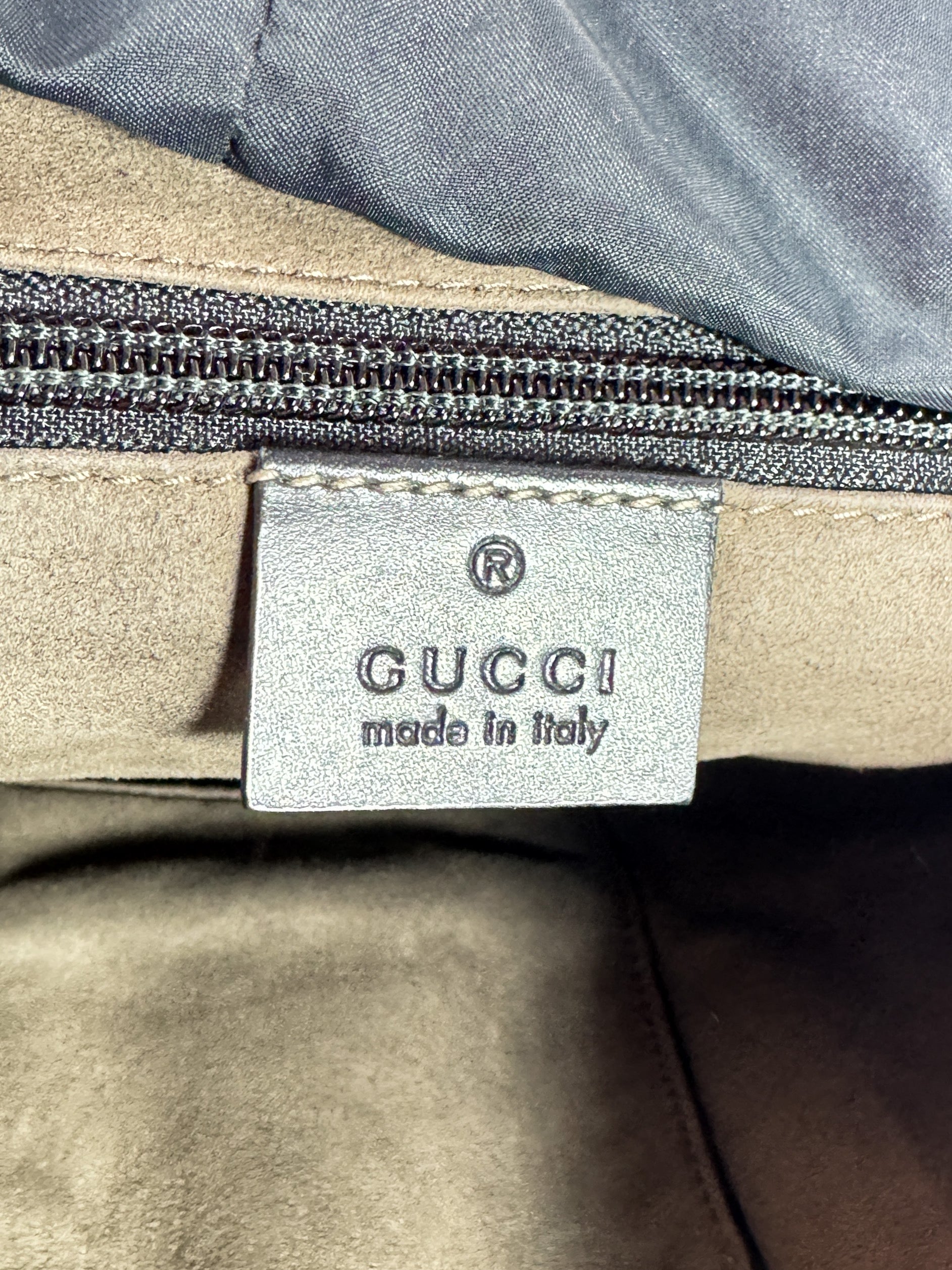 Gucci GG Supreme buckle backpack