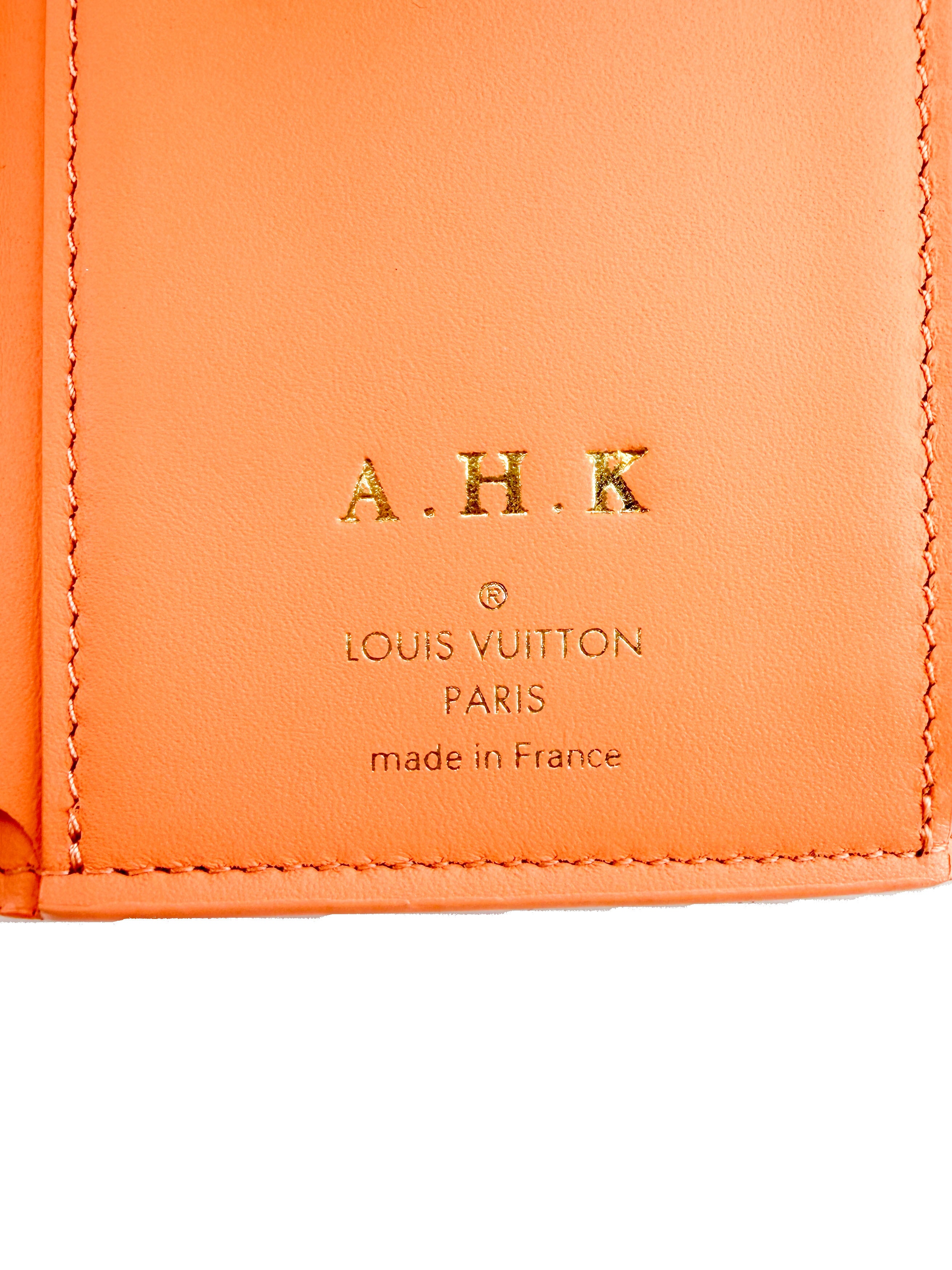 Louis Vuitton peach leather Capucines XS wallet NFC