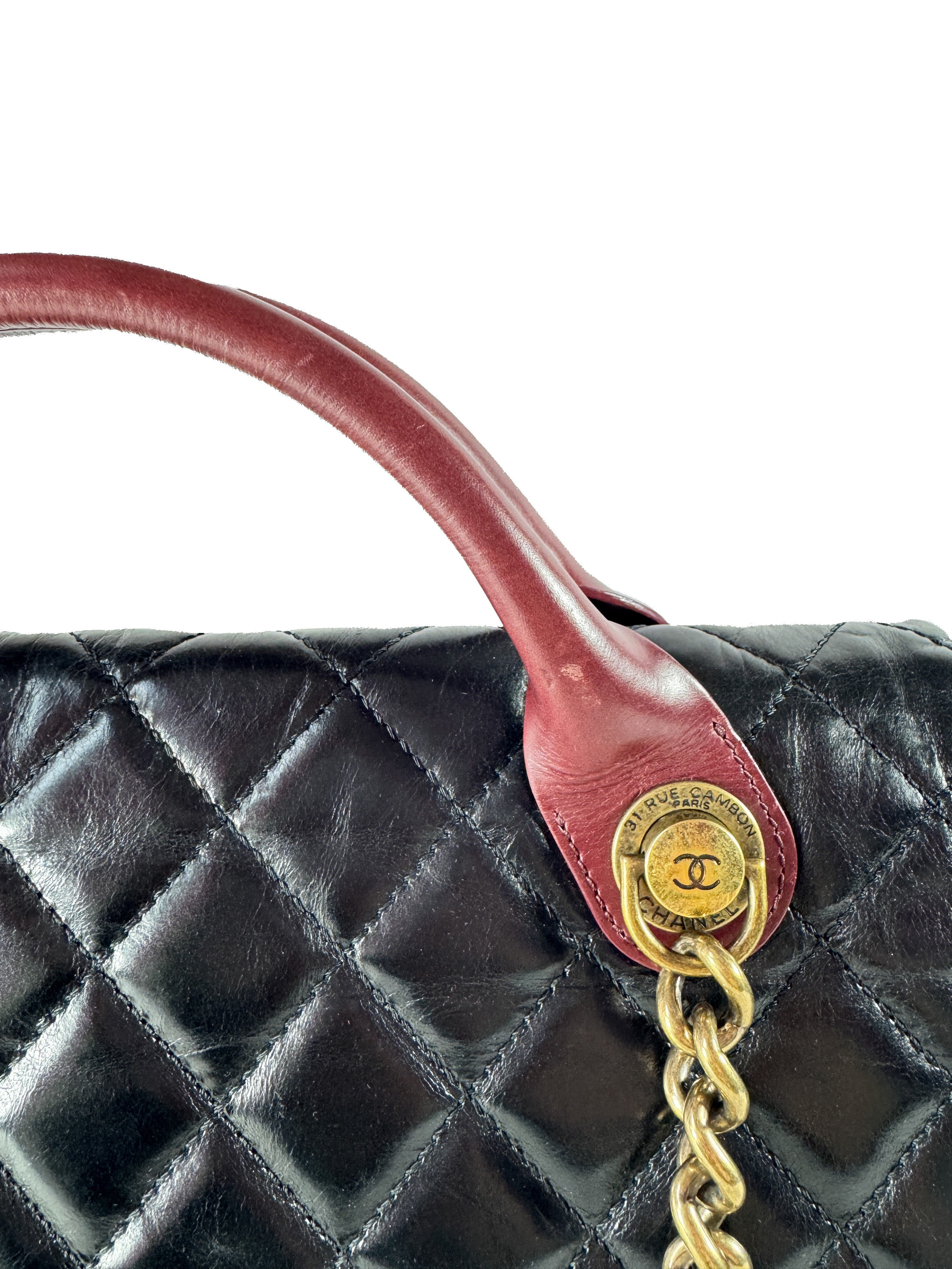 Chanel black/burgundy leather medium Castle Rock flap bag 23207144