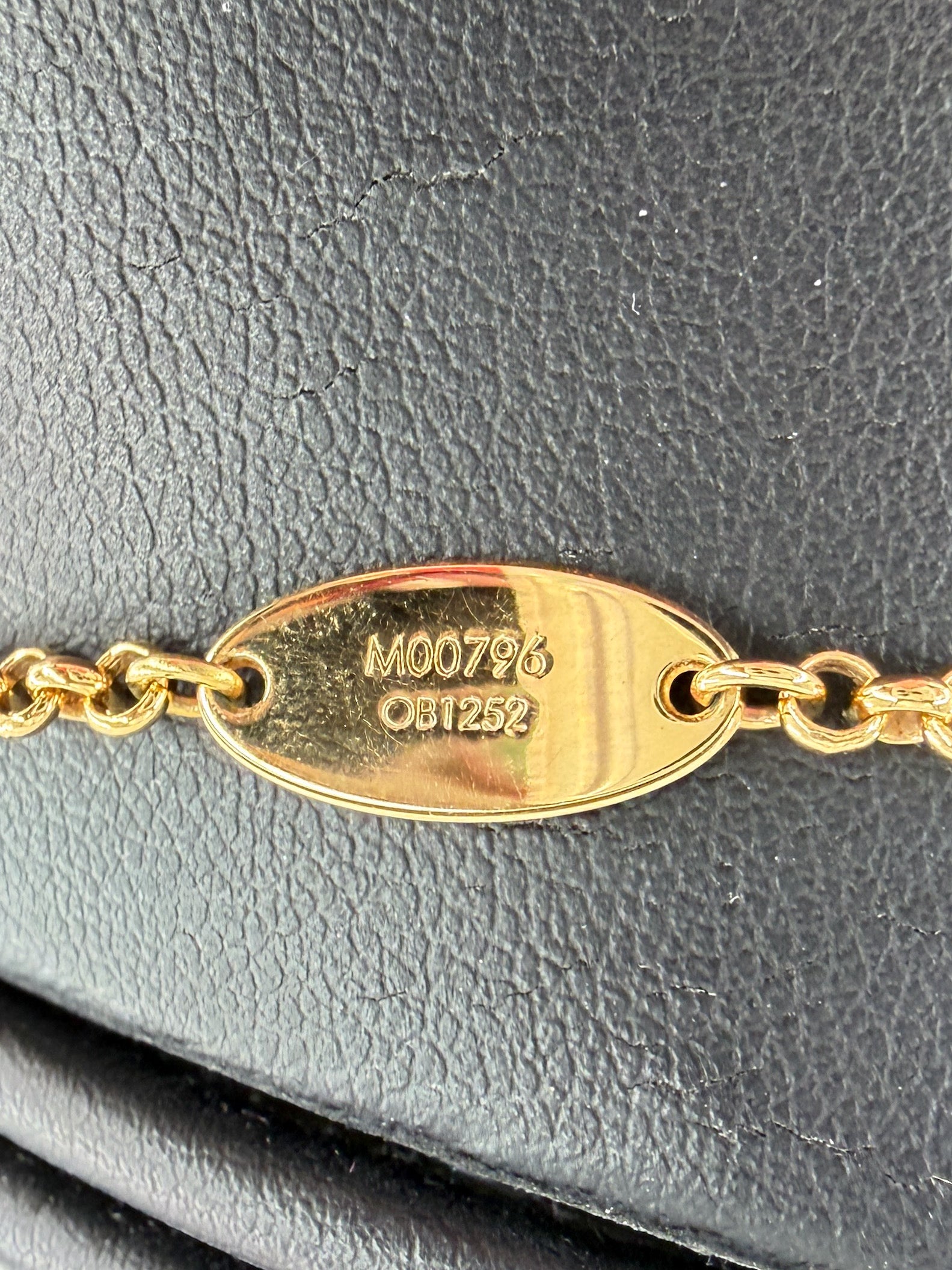 Louis Vuitton gold tone speedy mini bags necklace OB1252