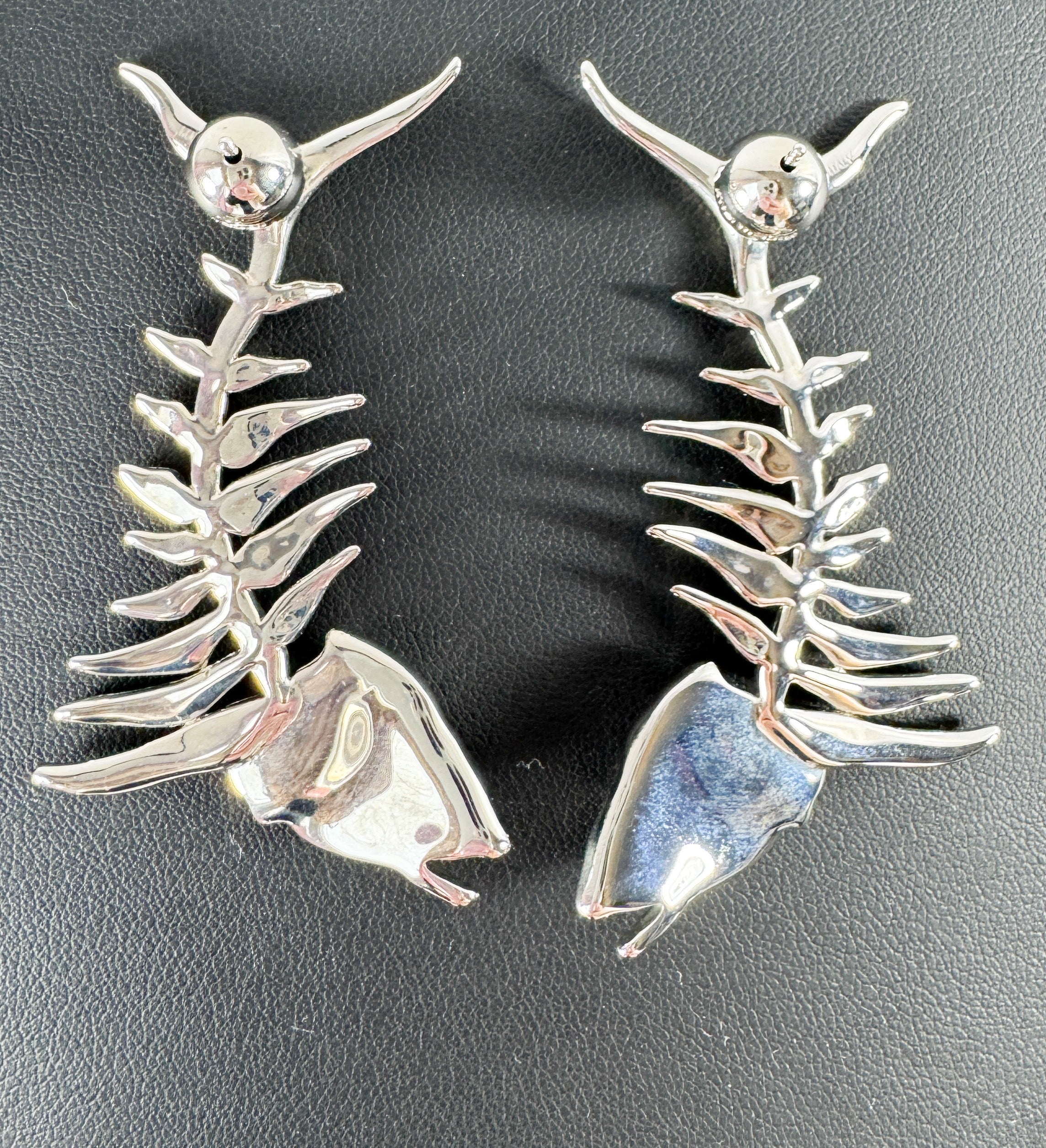 Burberry fishbone silver tone earrings