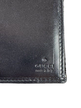 Gucci black embossed leather wallet 2067