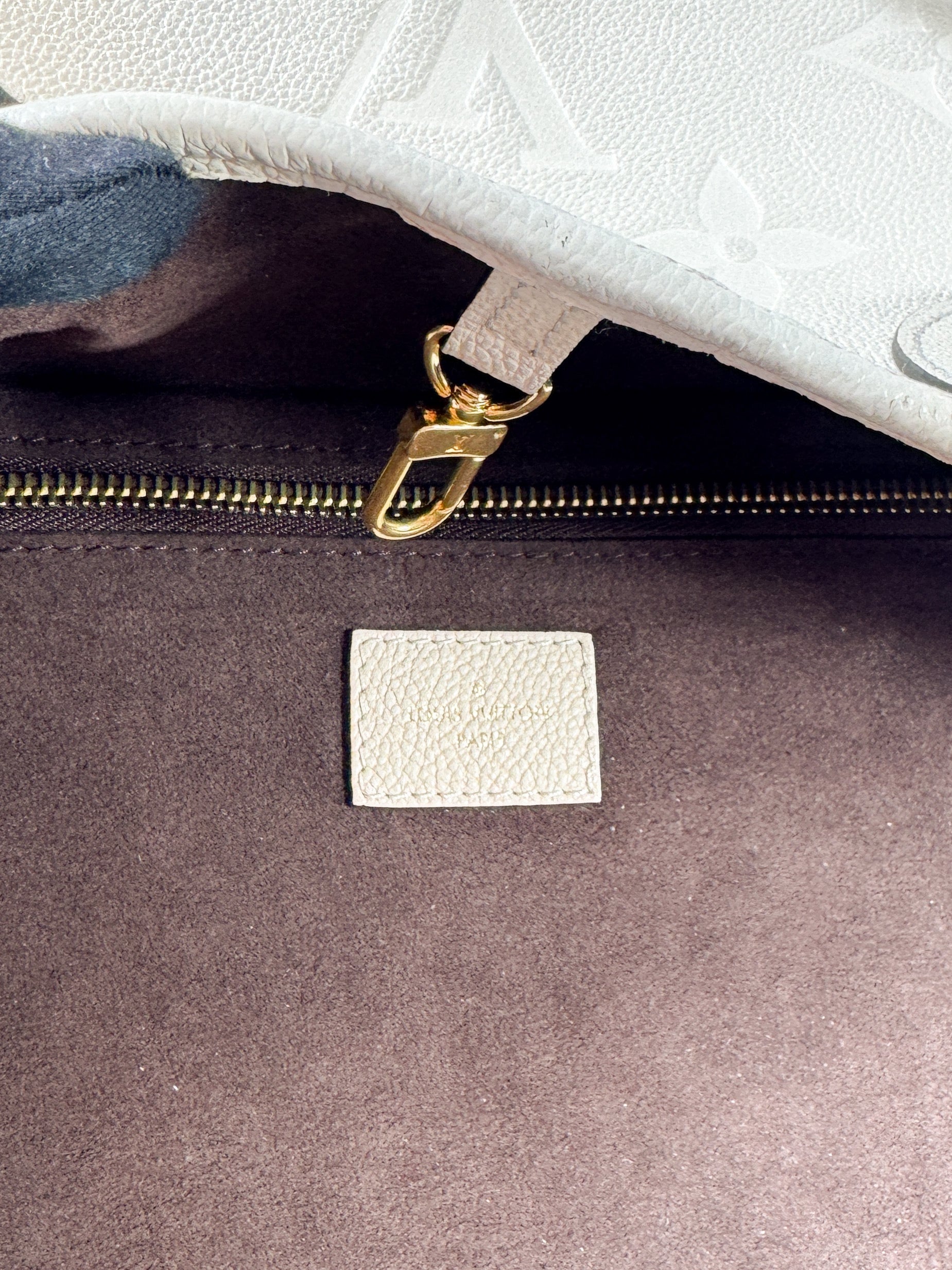 Louis Vuitton cream giant monogram empreinte Neverfull MM (NFC)