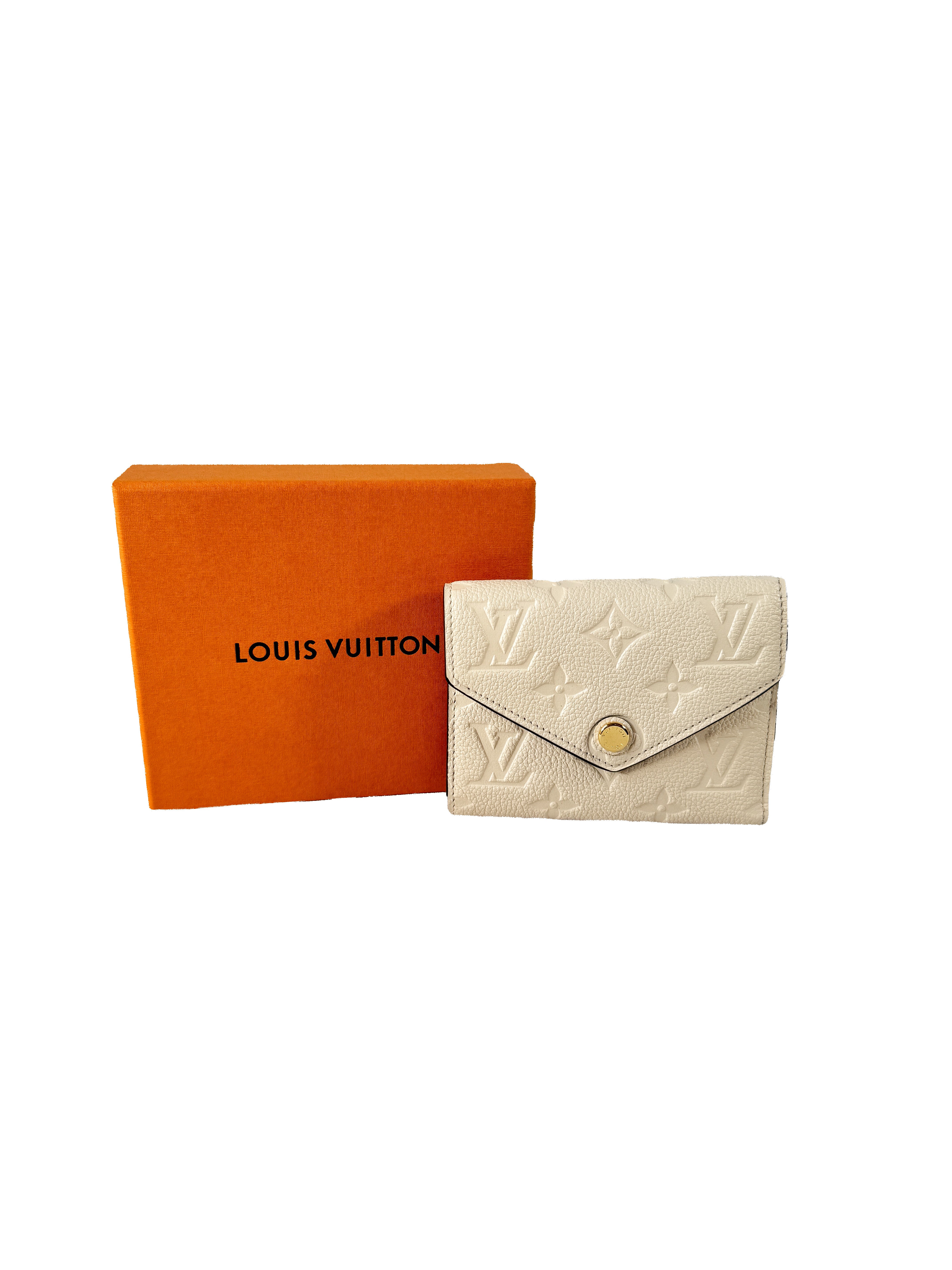 Louis Vuitton cream empreinte leather Giant monogram Victorine wallet (NFC)