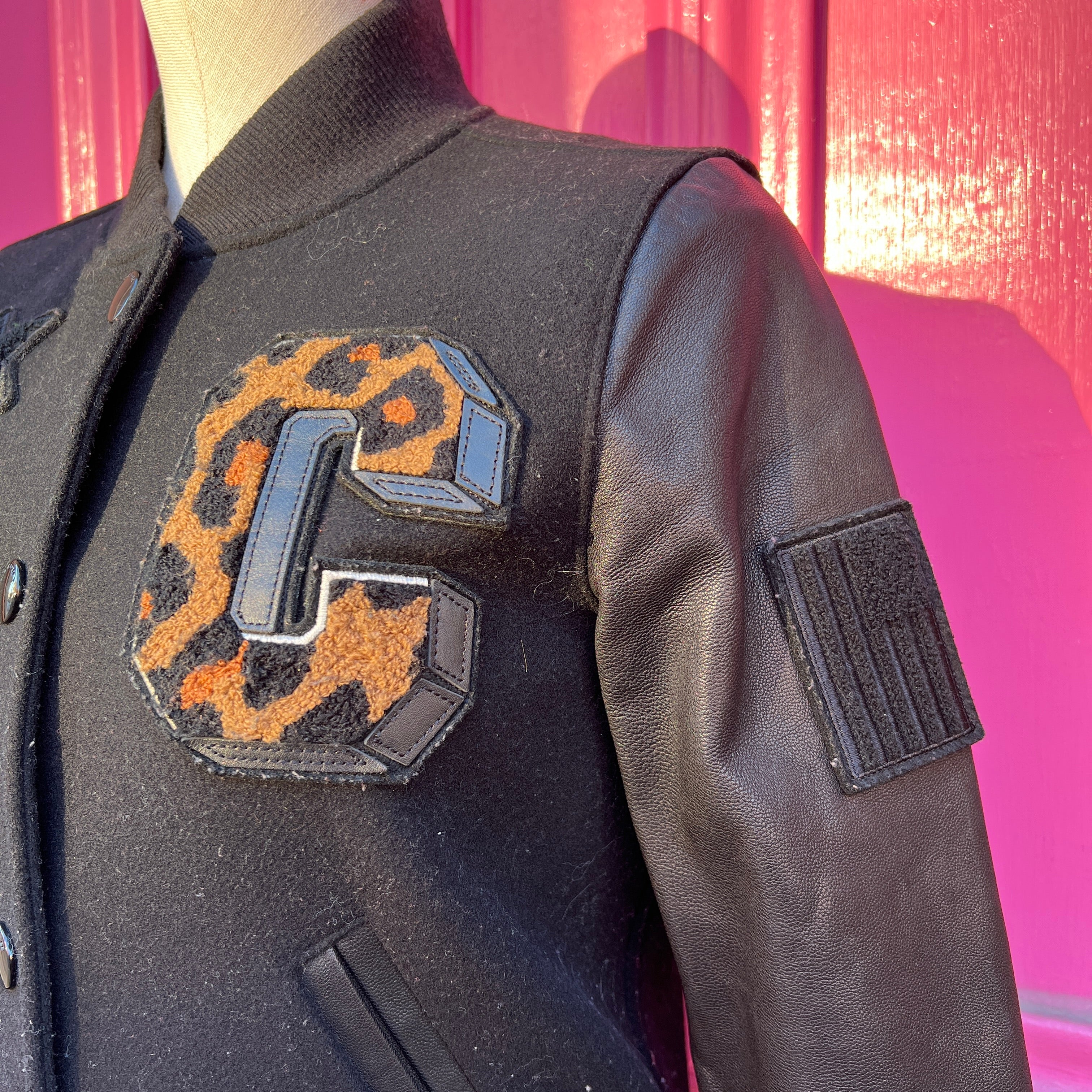Coach black leopard print letterman jacket size XXS