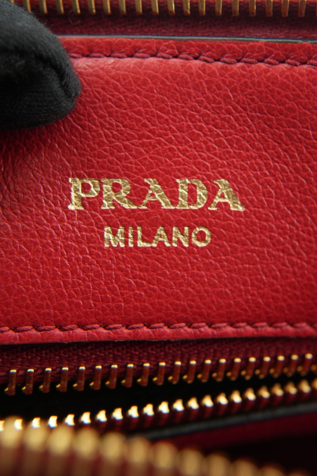 Prada red leather embossed logo satchel 204