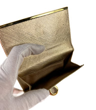 Salvatore Ferragamo gold leather metallic wallet