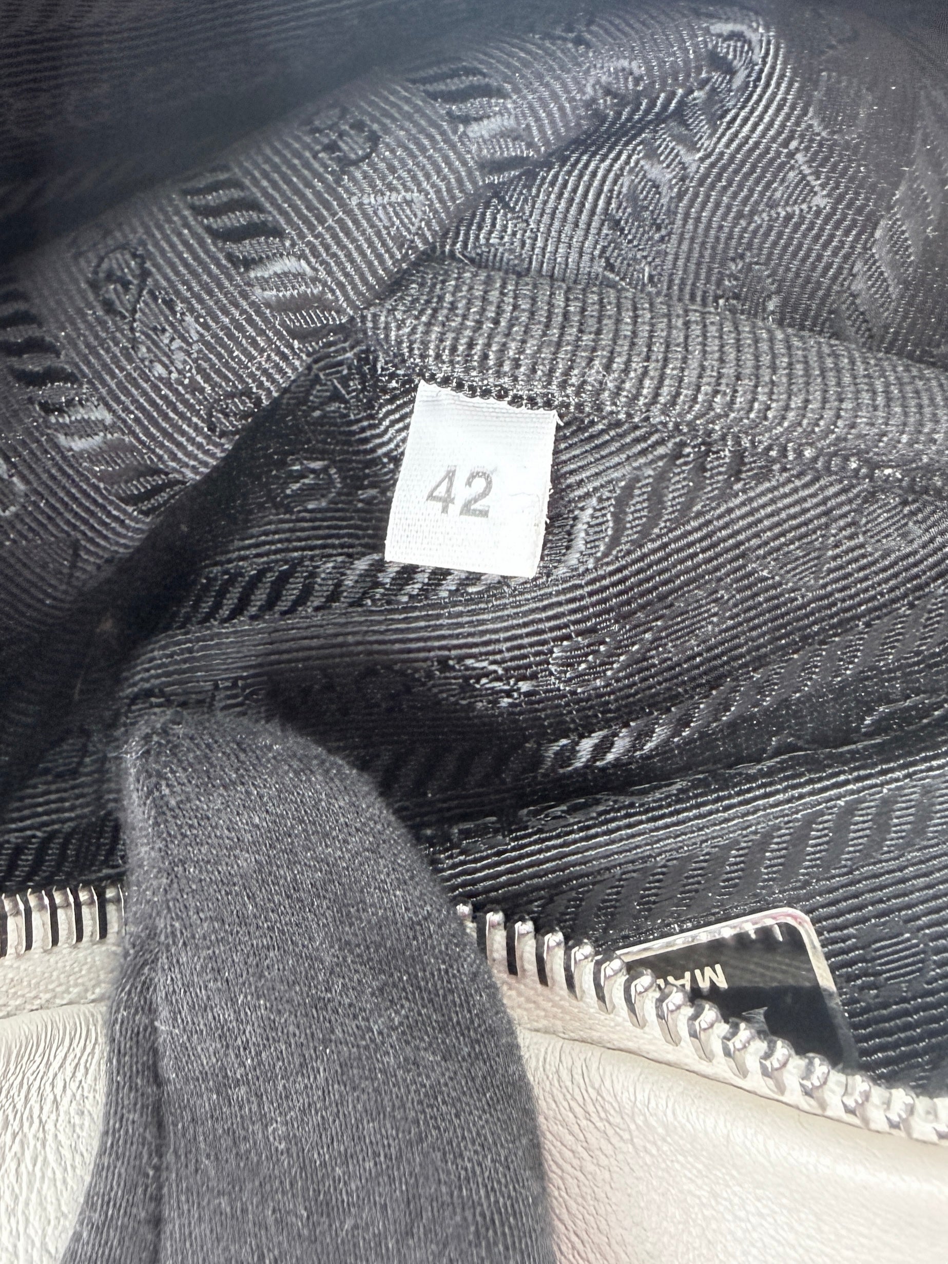 Prada white leather Triangle bag 42