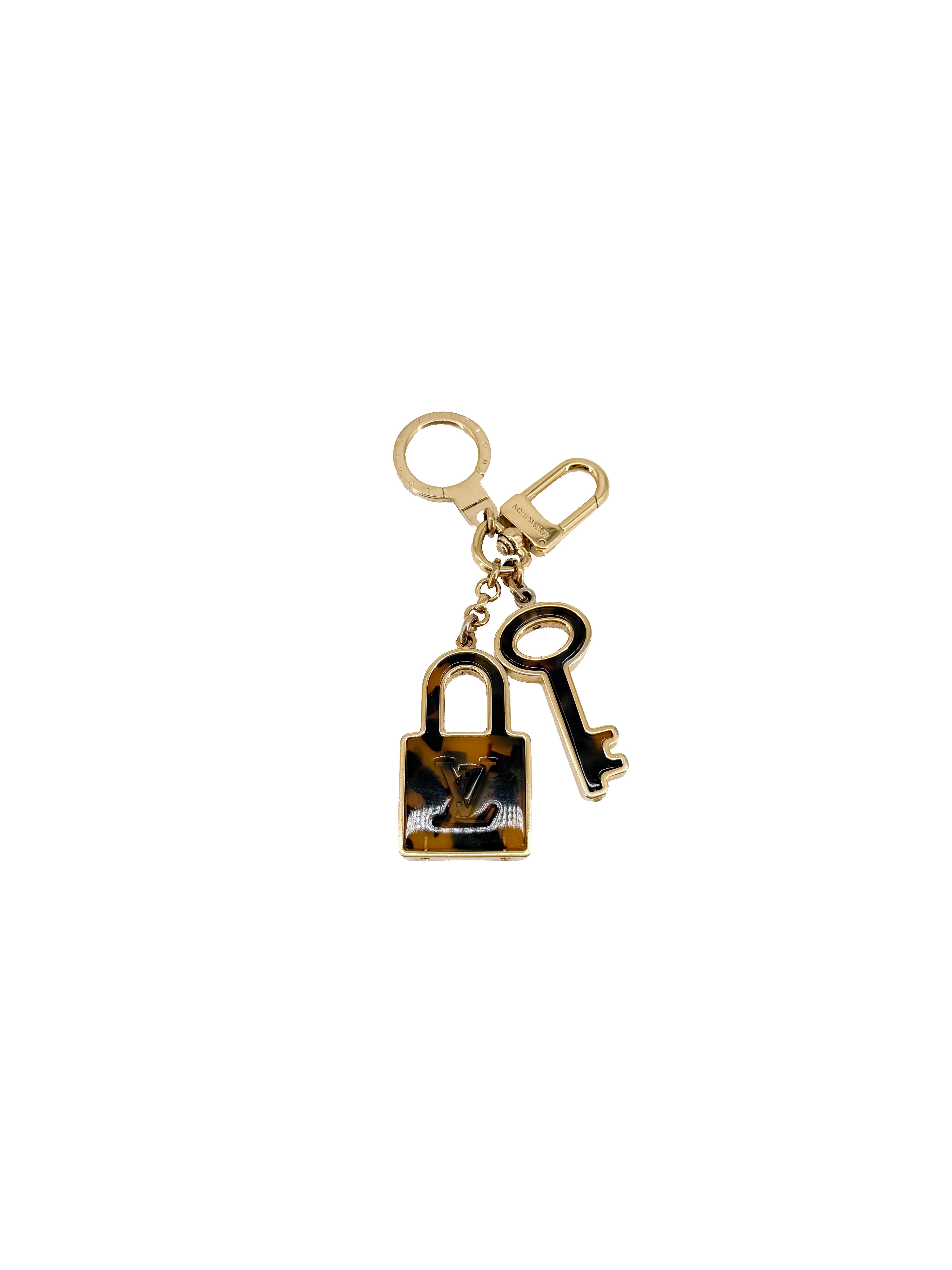 Louis Vuitton tortoise Porte Cles Confidence bag charm OB0112
