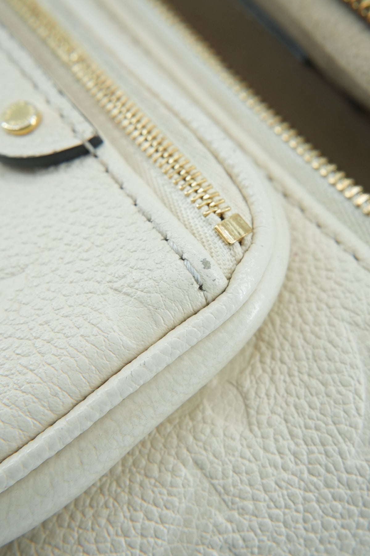 Louis Vuitton cream empreinte mini bumbag NFC