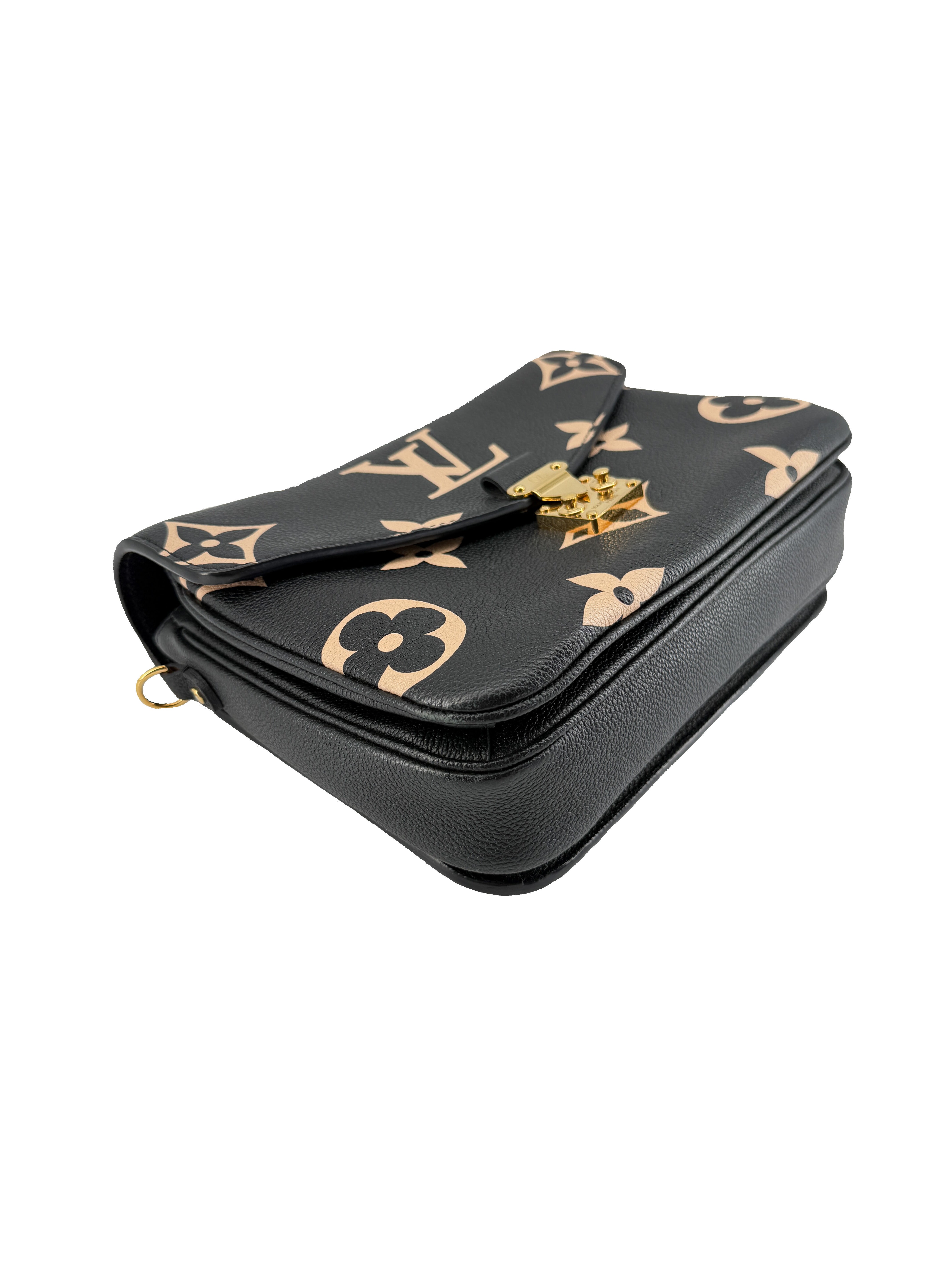 Louis Vuitton black, cream empreinte leather Pochette Metis DU5210