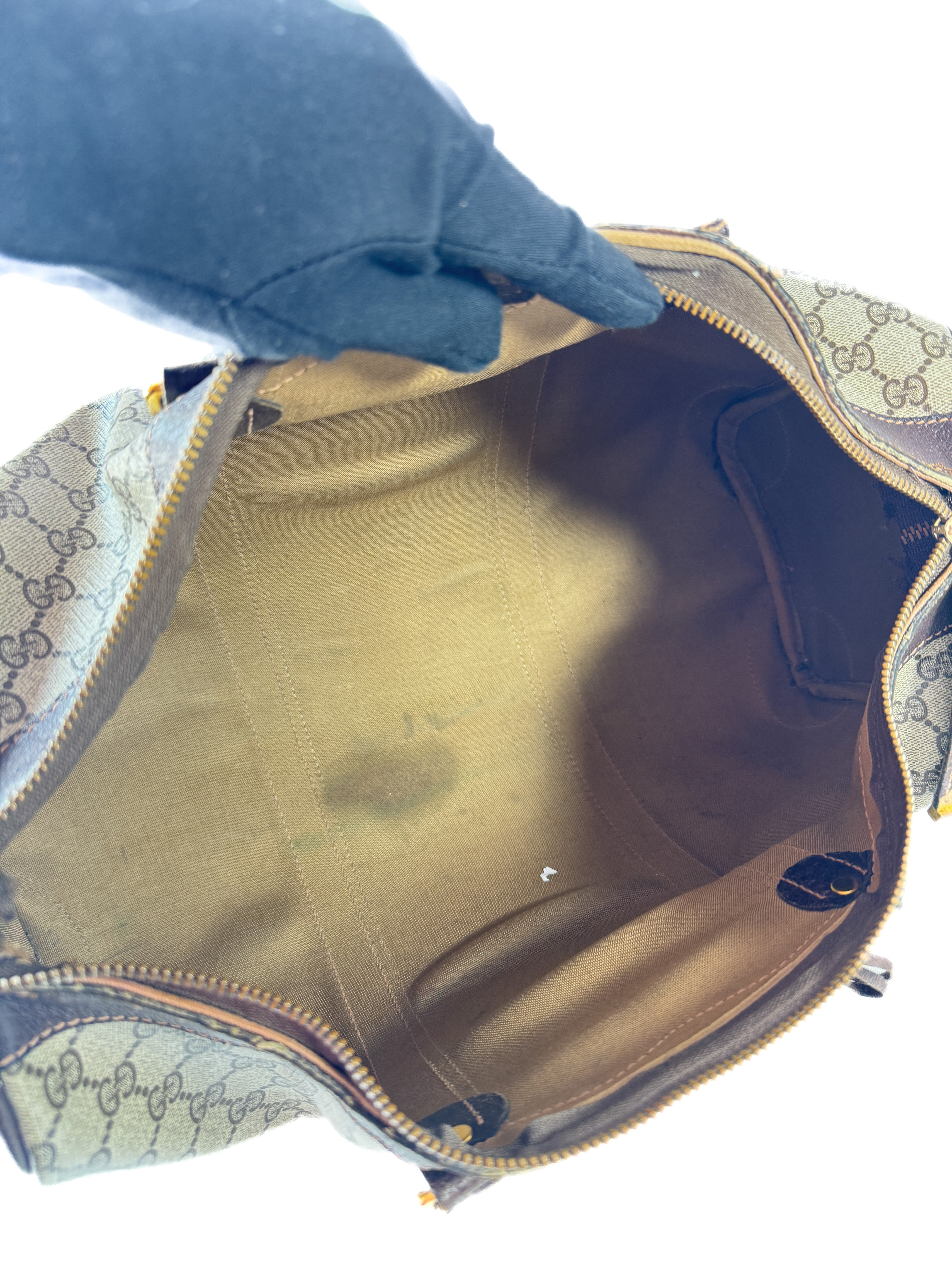 Gucci Supreme 1980s signature mini duffle bag