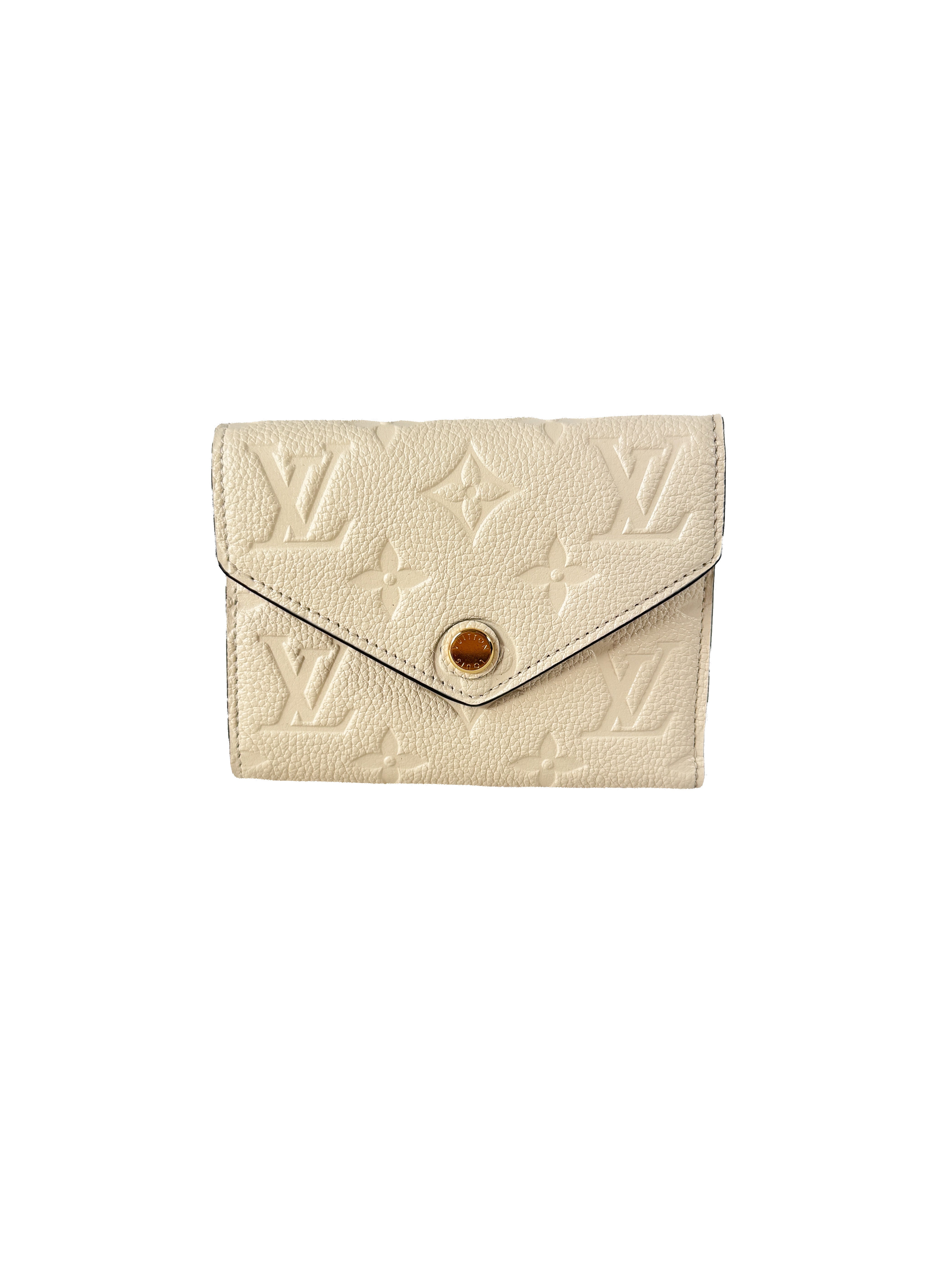 Louis Vuitton cream empreinte leather Giant monogram Victorine wallet (NFC)